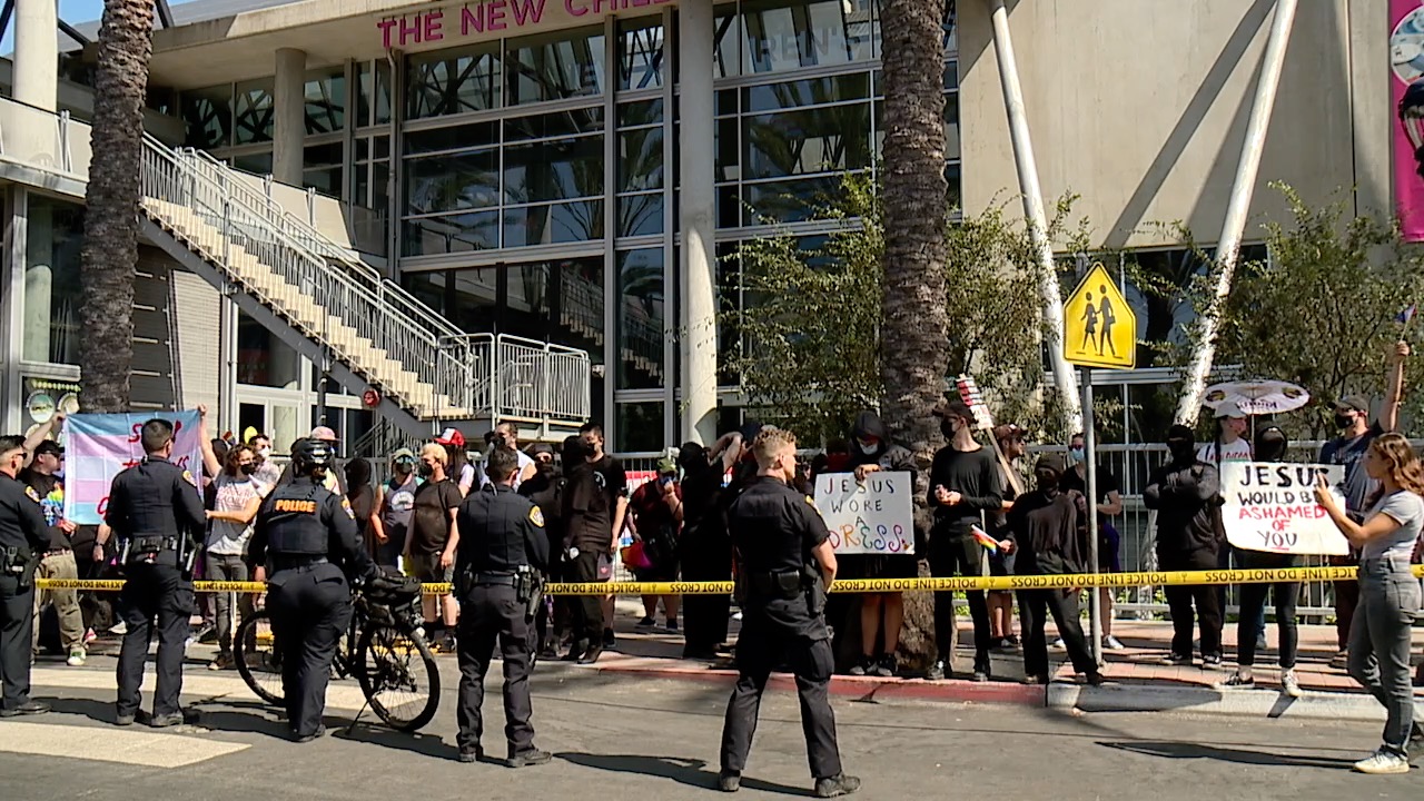 Protesters and supporters gather on the sidewalks outside of the New Children's Museum over drag show story time.