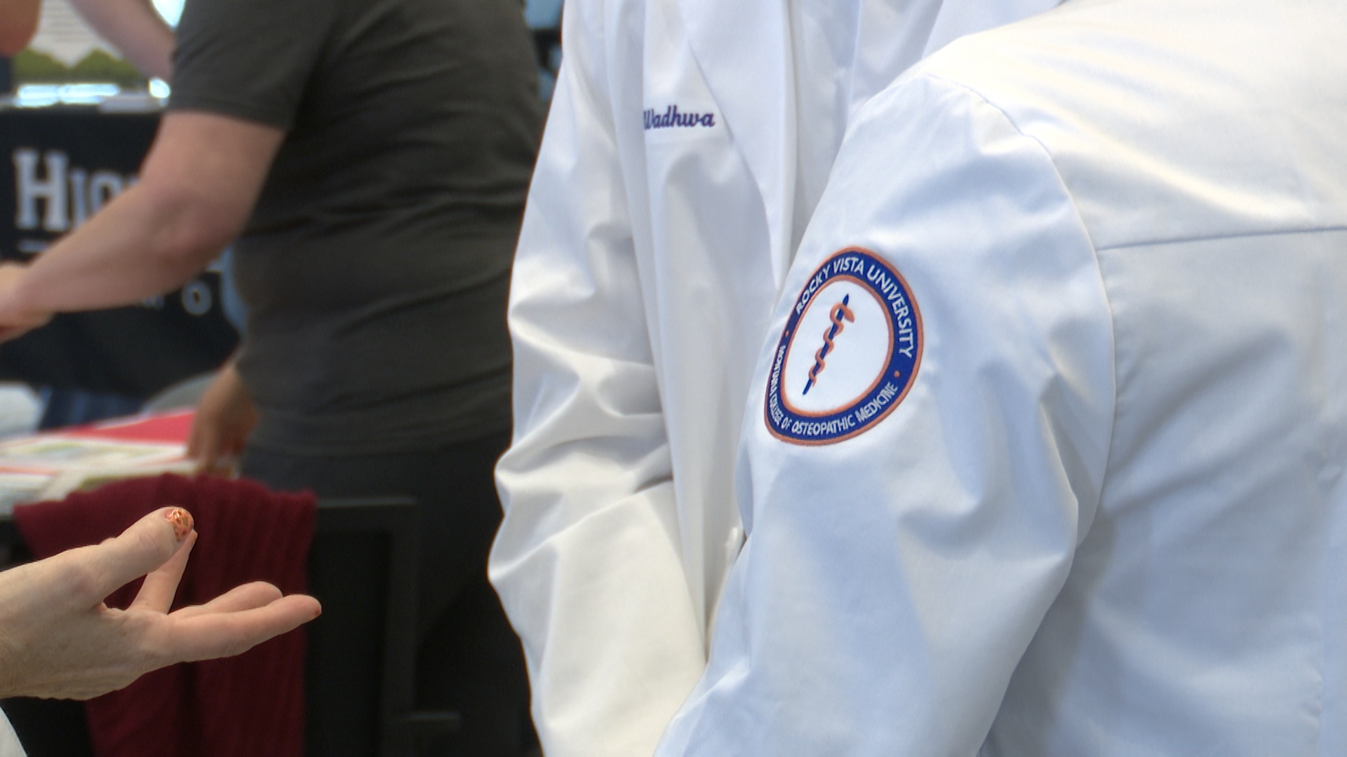 Students at Rocky Vista University speaking with Montana HOSA competitors