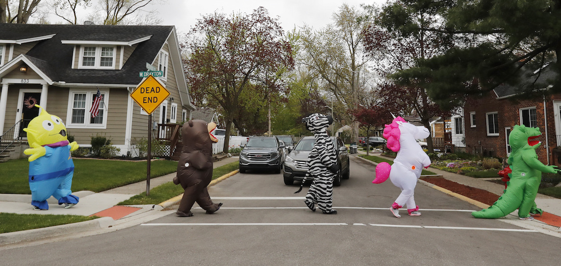 Detroit-area residents lift spirits with costumed parades