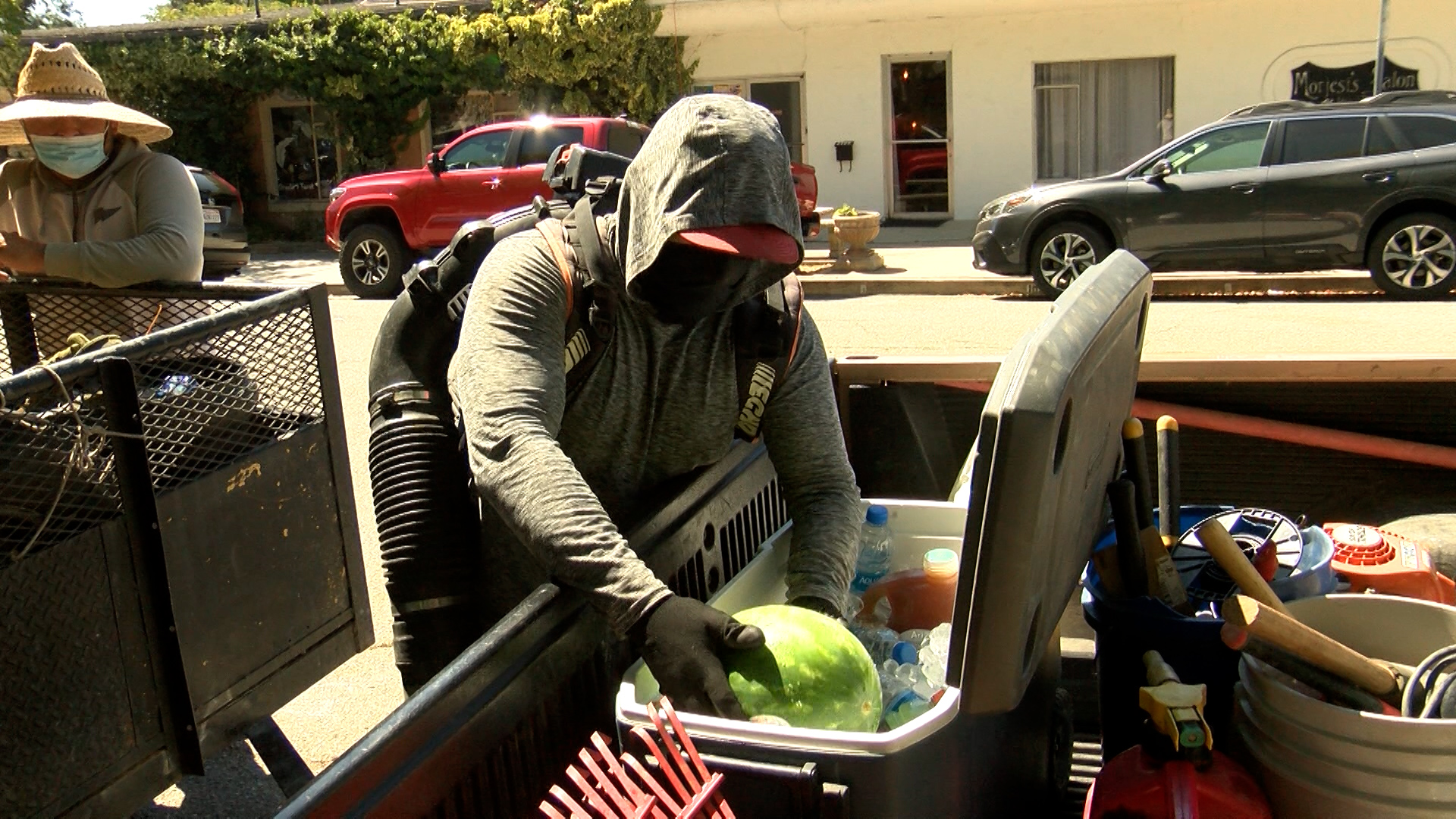 Jimenez said he carries a cooler packed with ice, water bottles and sometimes fruit such as watermelon. 