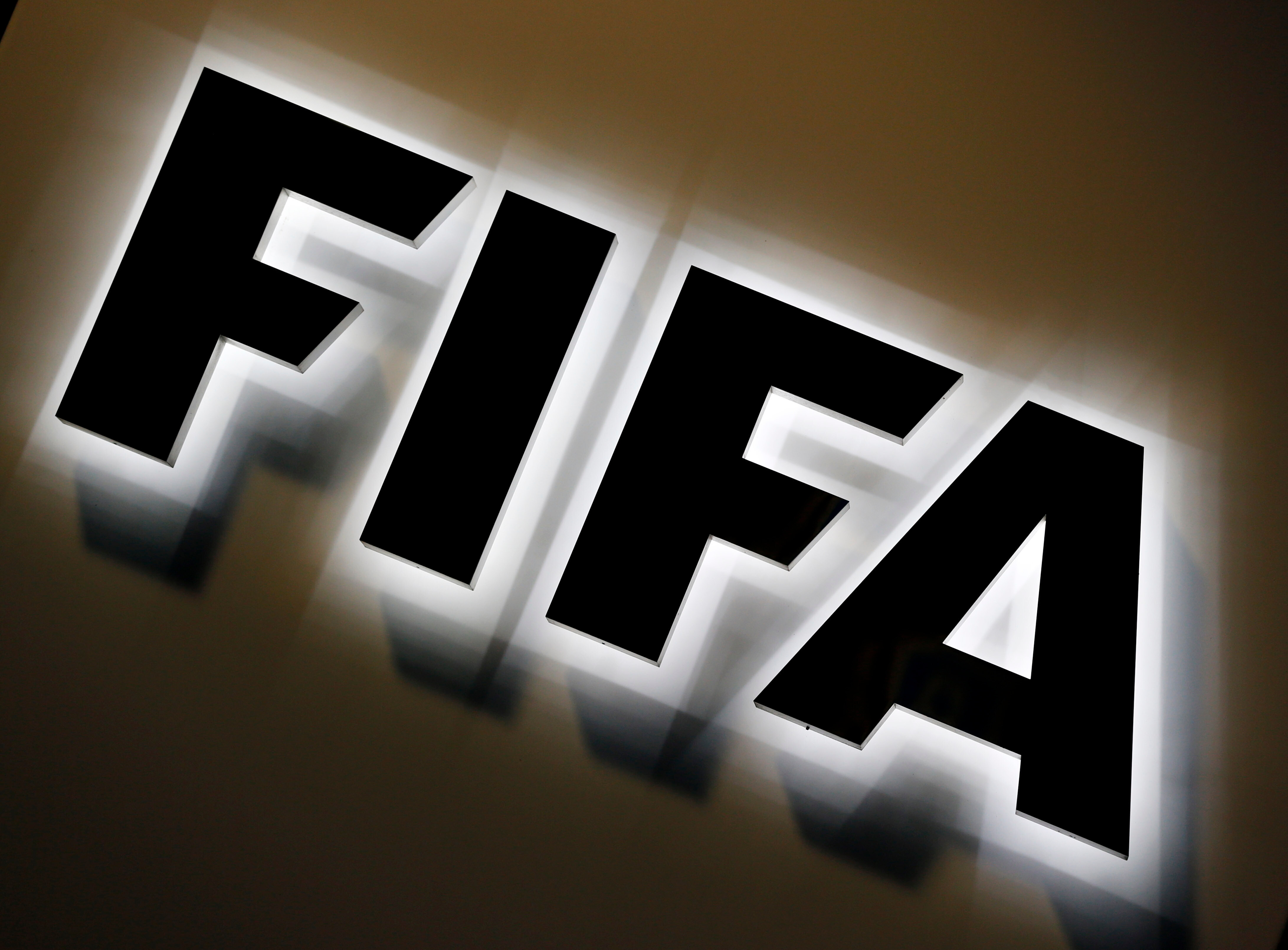 The FIFA logo is seen outside FIFA headquarters in Zurich, Switzerland.
