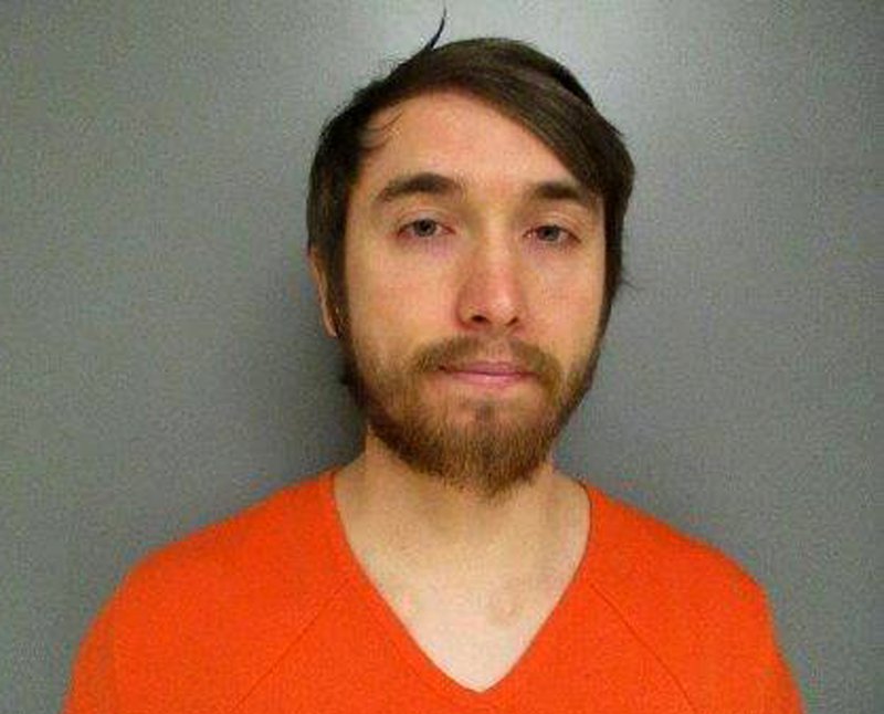 This undated booking photo from the Saline County Jail in Nebraska shows Titus Miller. The FBI has established a website to help investigators identify any children who may have been victimized by Miller, a Lincoln day care employee, accused of producing child pornography. (Saline County Jail via AP)