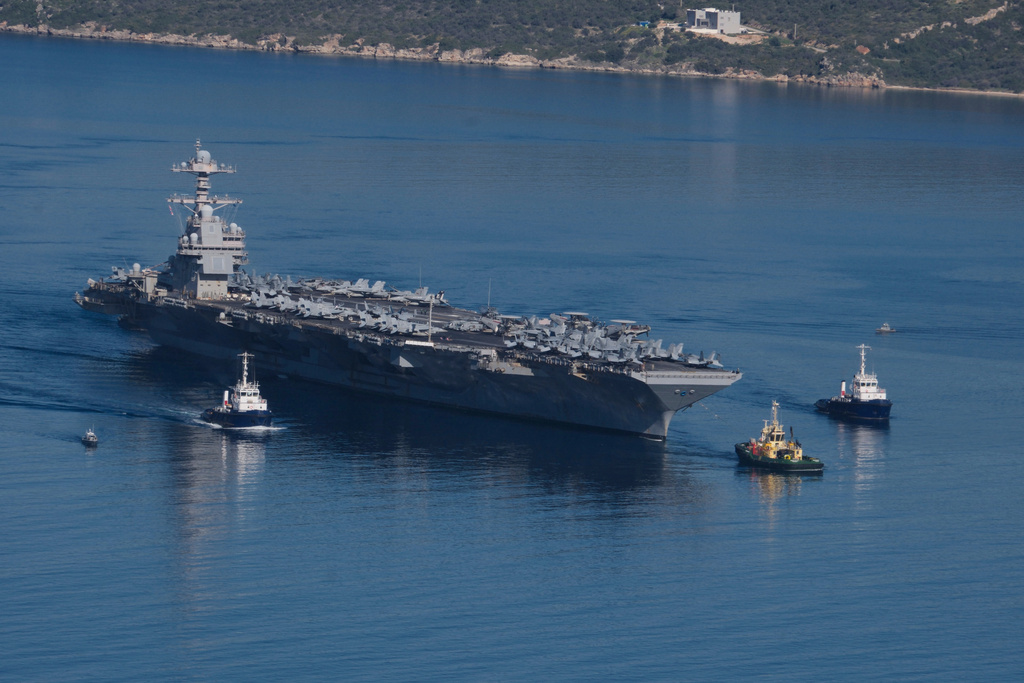 The USS Gerald R. Ford, the world’s largest aircraft carrier, departs from Souda Naval Base near Chania on the island of Crete, Greece, Thursday, Feb. 26, 2026.