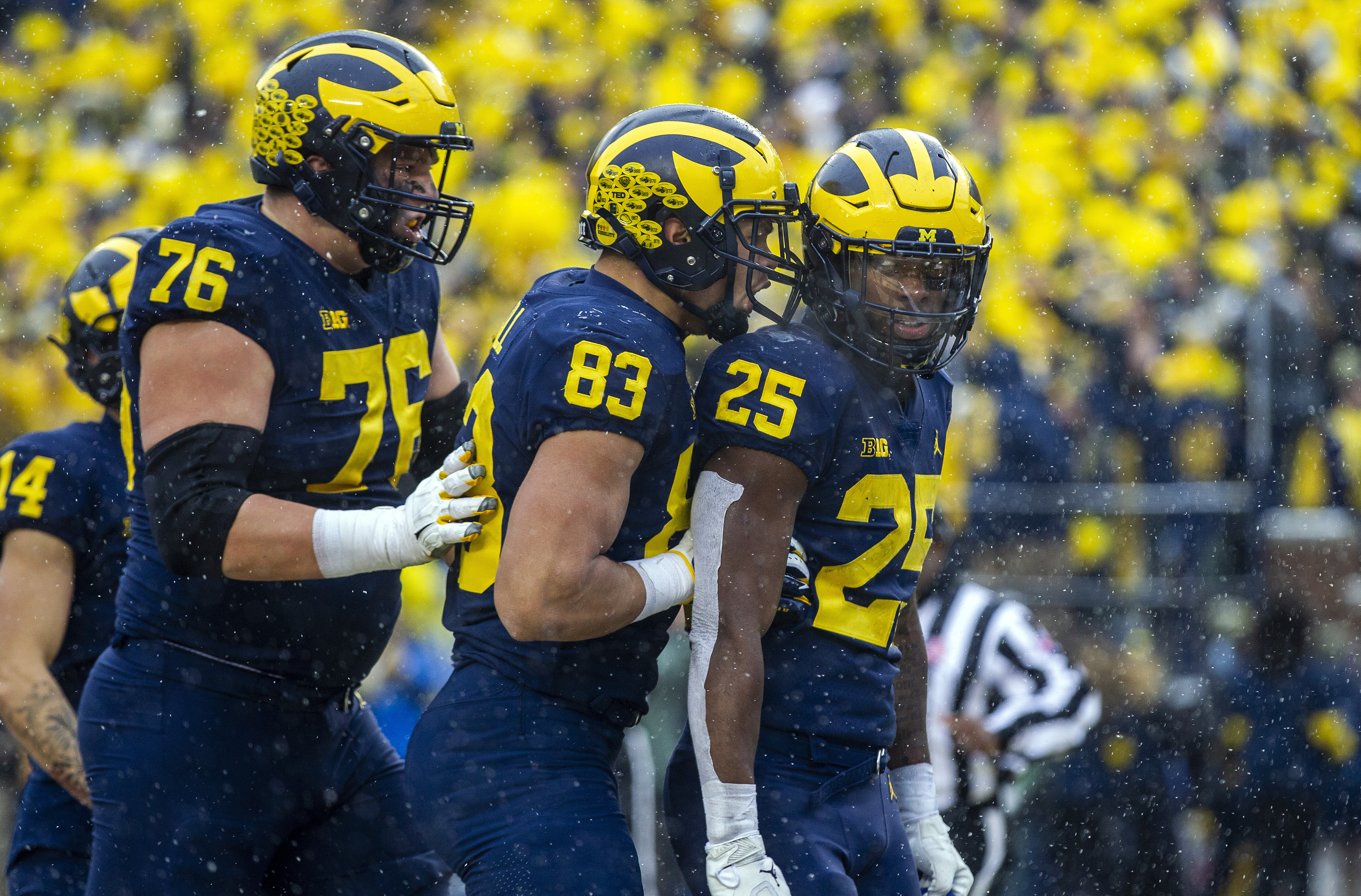 Ryan Hayes, Erick All, Hassan Haskins