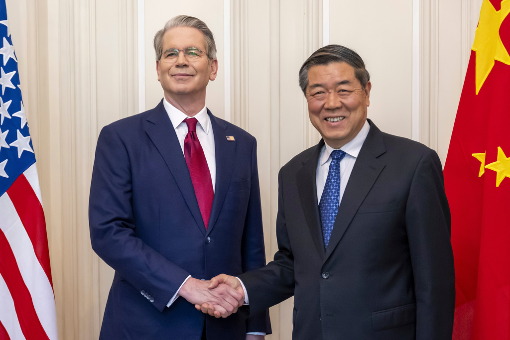 U.S. Secretary of the Treasury Scott Bessent, left, shakes hands with Chinese Vice Premier He Lifeng, right, during a bilateral meeting between the United States and China, in Geneva, Switzerland, on Saturday, May 10, 2025.