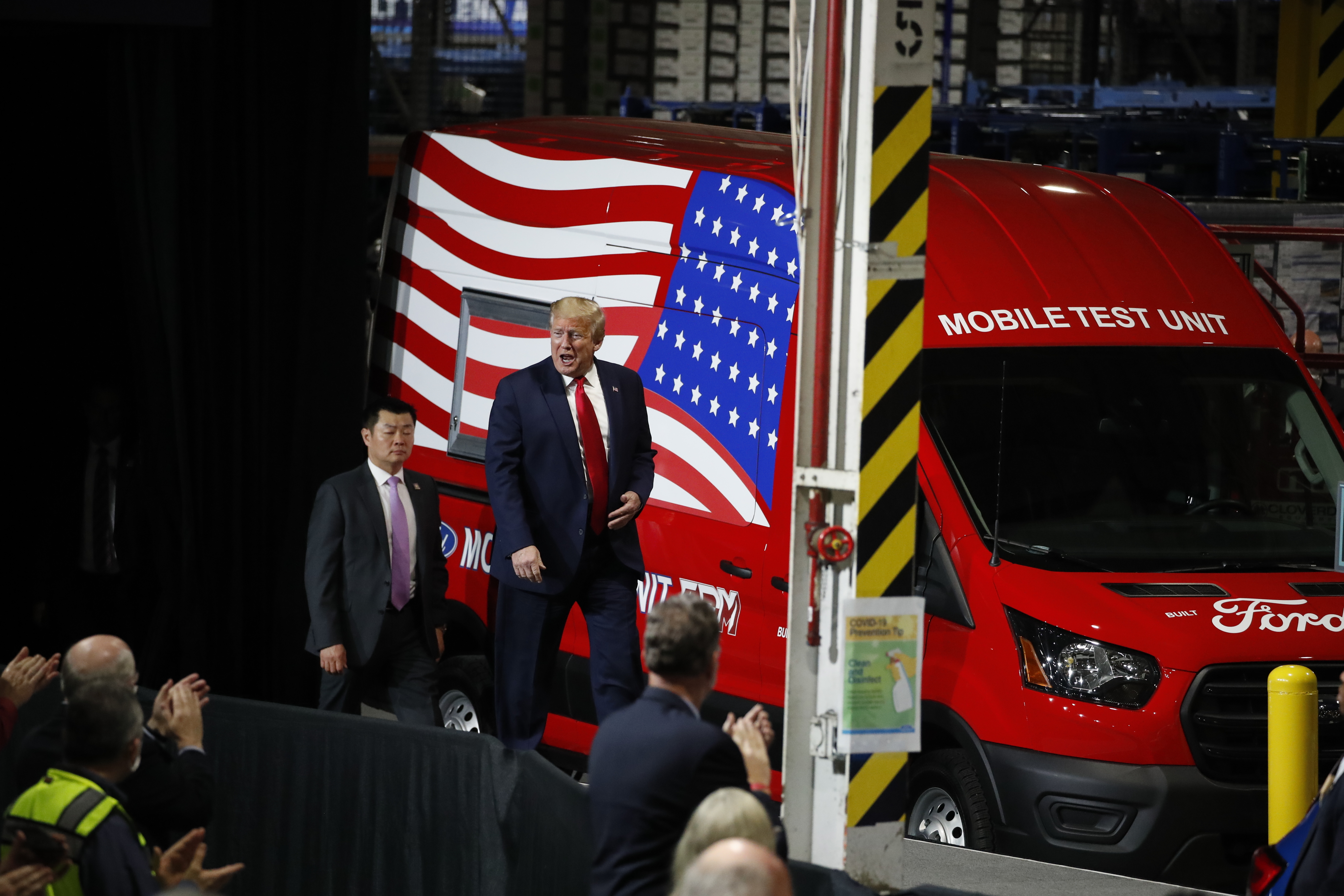 Photo shows President Trump wearing mask while touring Ford plant in Ypsilanti