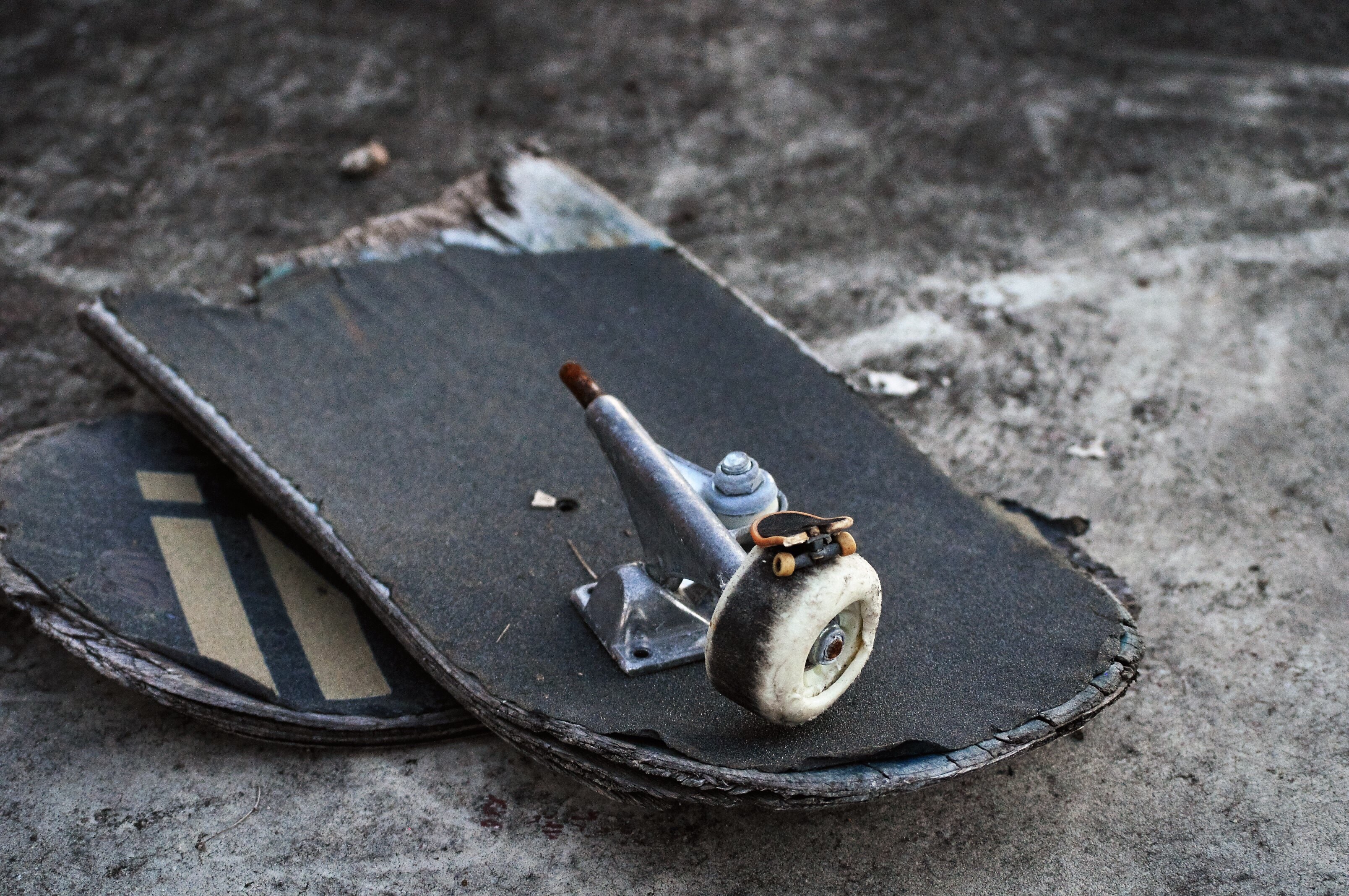 Broken skateboard - stock image
