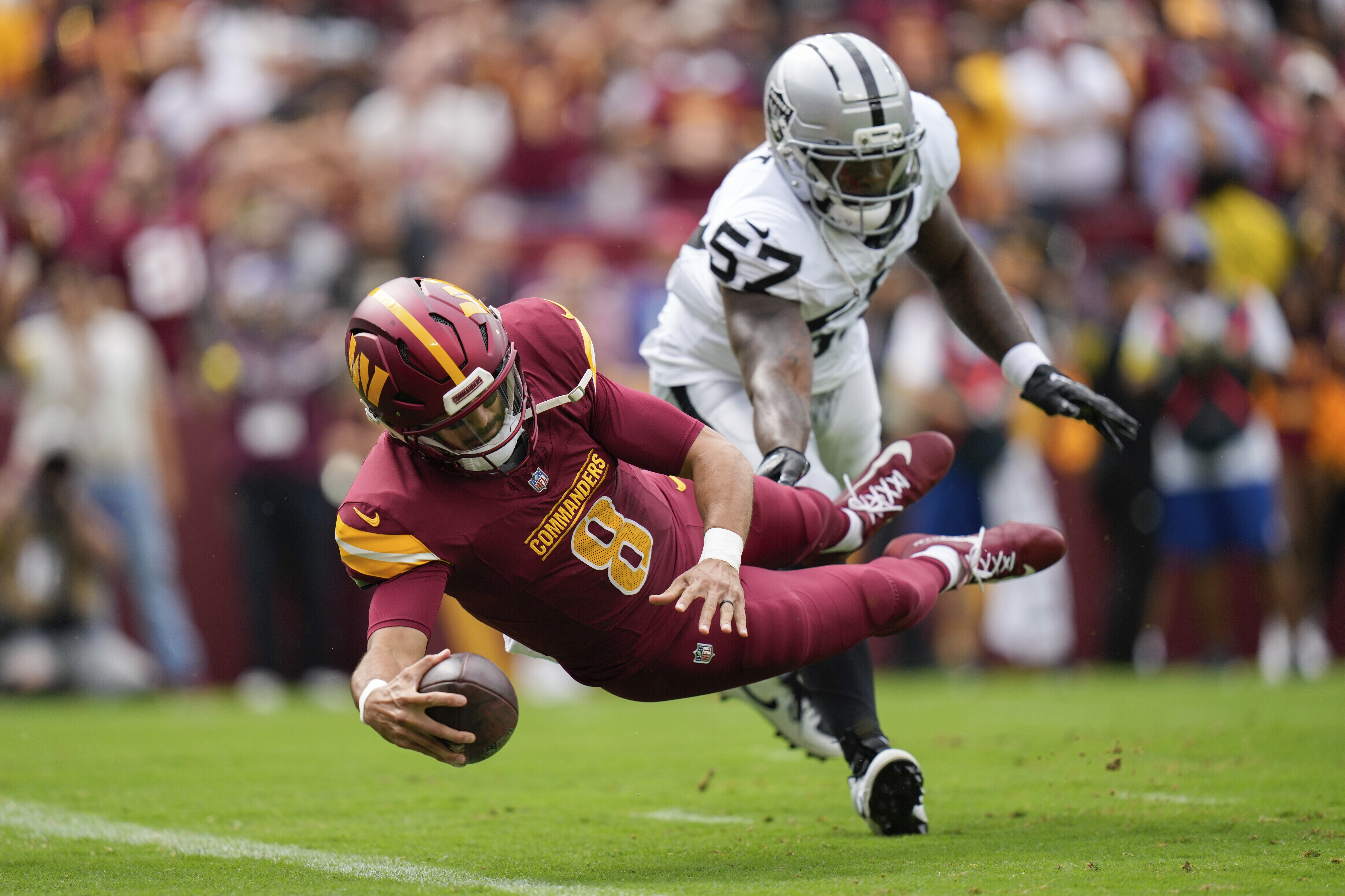 APTOPIX Raiders Commanders Football