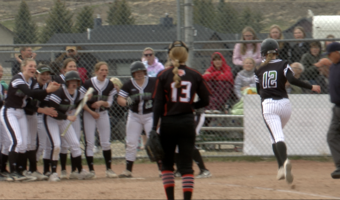 Ennis' Liz Olsen celebrates home run