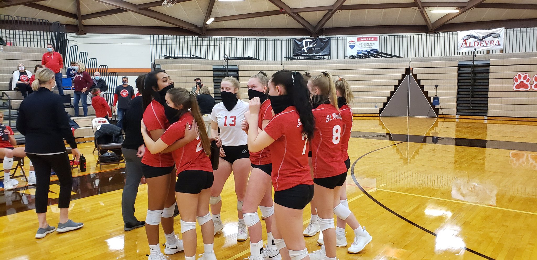 Battle Creek St. Philip celebrates the fifth set victory