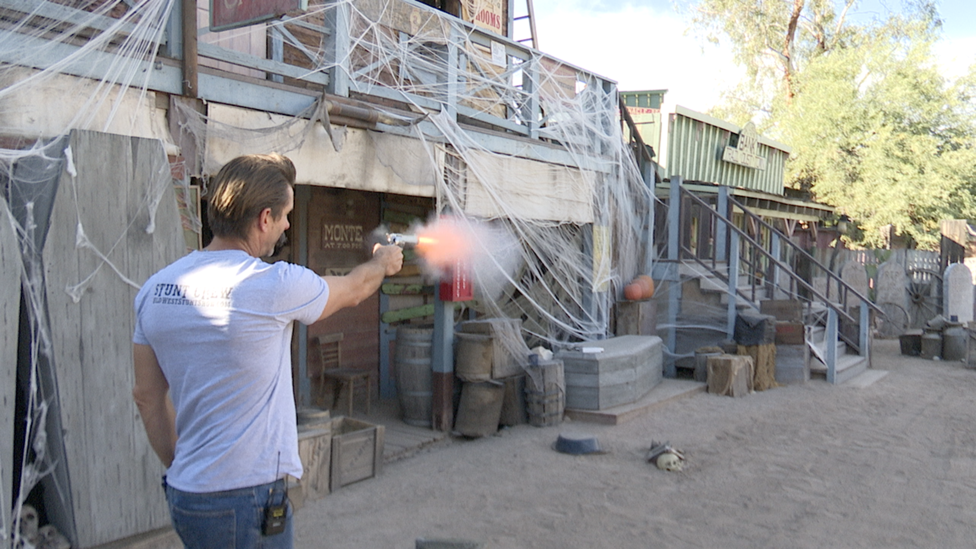 Pistoleros Wild West Show owner and actor Jerry Woods fires a blank round on the show's set at Trail Dust Town in Tucson.