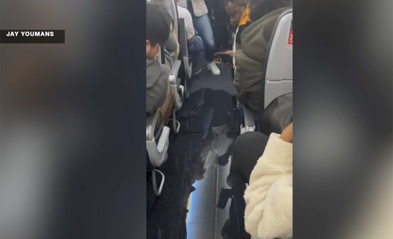 Jay Youmans and his family spent two and a half extra days at Connecticut airport after burst pipe sent water rushing down aircraft aisle