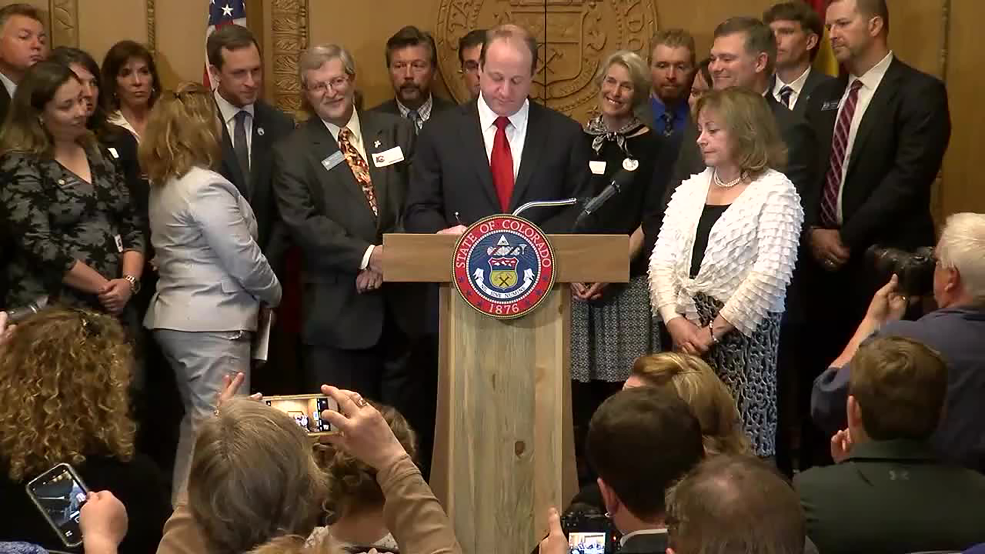 jared polis signs sb181 oil and gas bill.png
