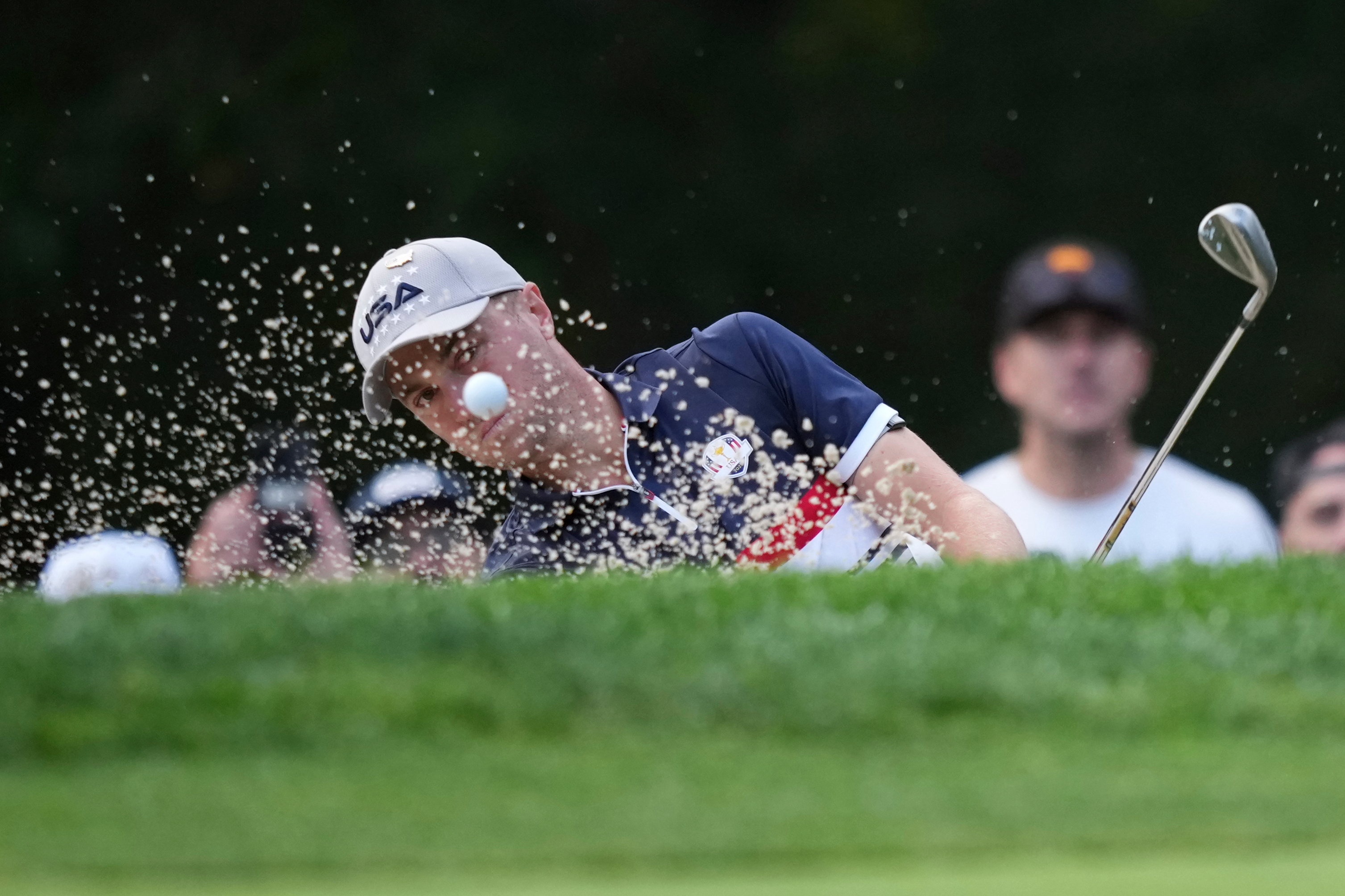 United States' Justin Thomas hits from the bunker on the third hole at Bethpage Black golf course during the Ryder Cup golf tournament, Friday, Sept. 26, 2025, in Farmingdale, N.Y. 