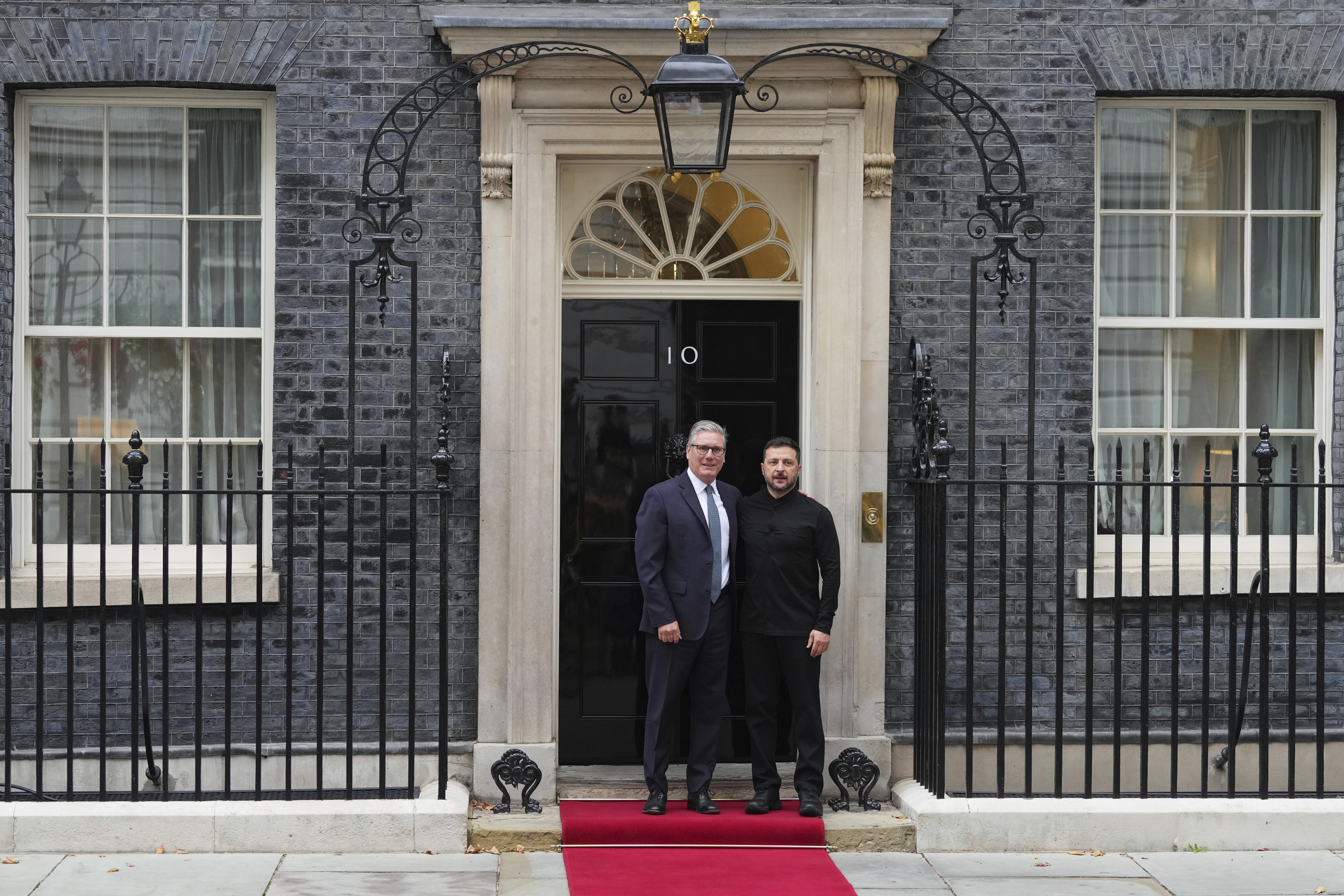 Britain's Prime Minister Keir Starmer, left, welcomes Ukraine's President Volodymyr Zelenskyy to Downing Street in London, Thursday, Aug. 14, 2025. 