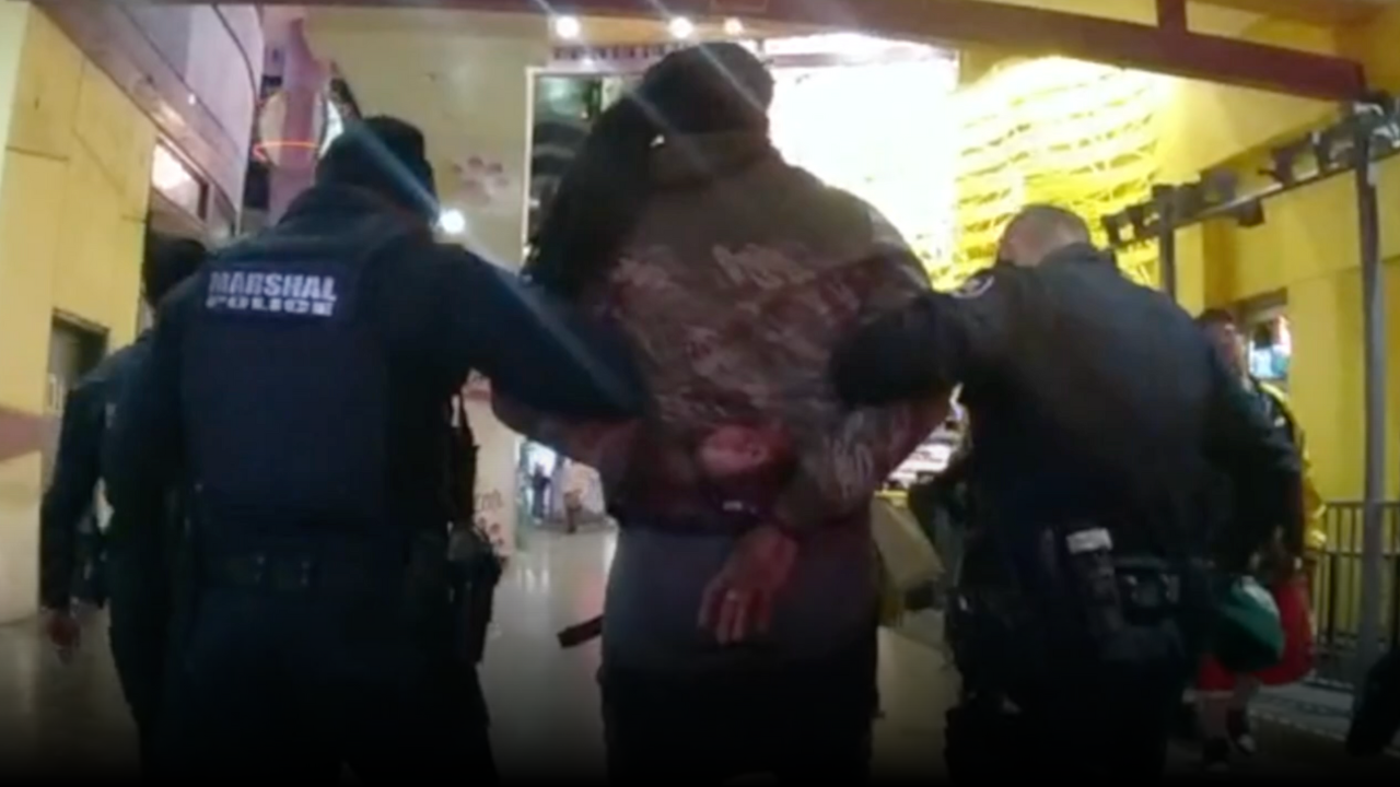 Las Vegas settles lawsuit with $150K payout over alleged false arrest and racial profiling by city marshals in mistaken identity case at Fremont Street Experience.