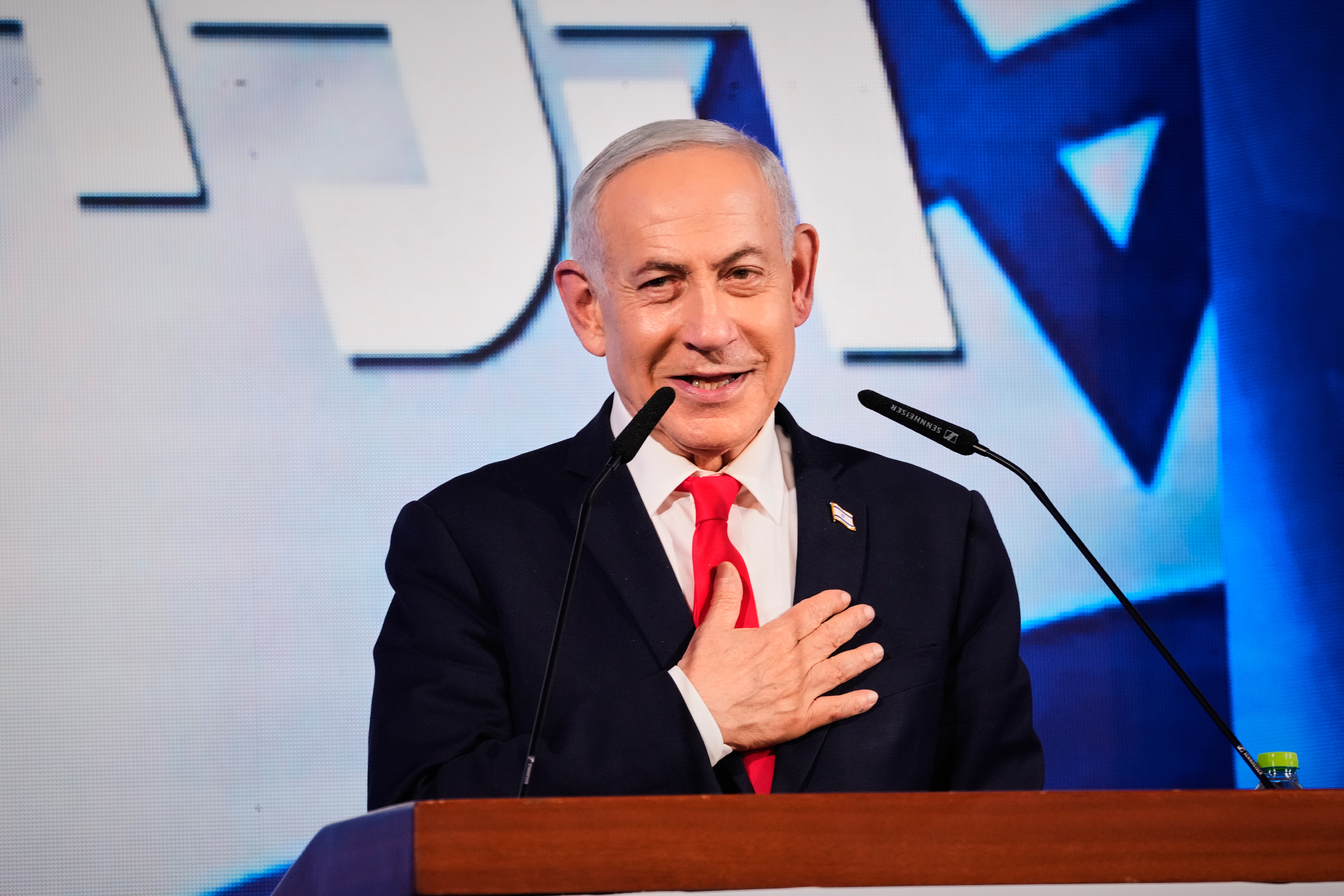 Israeli Prime Minister Benjamin Netanyahu speaks to his supporters at Likud party headquarters in Jerusalem after the release of the first exit poll results in Israel's general election, Wednesday, Oct. 28, 2026. 