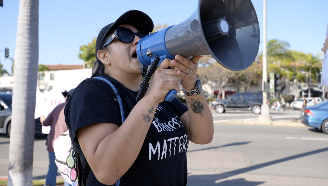 Healthcare workers protest maternity ward closure outside Scripps Health event
