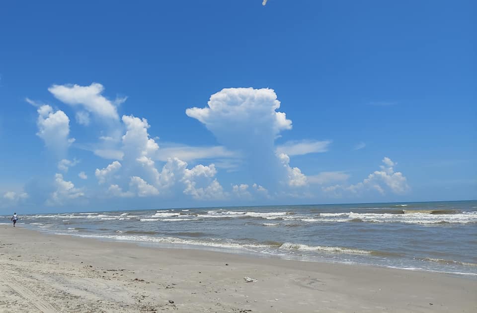 Gulf showers seen from Bob Hall Pier - Photo By: FB Coastal Bend Weather Watcher Cal Adele