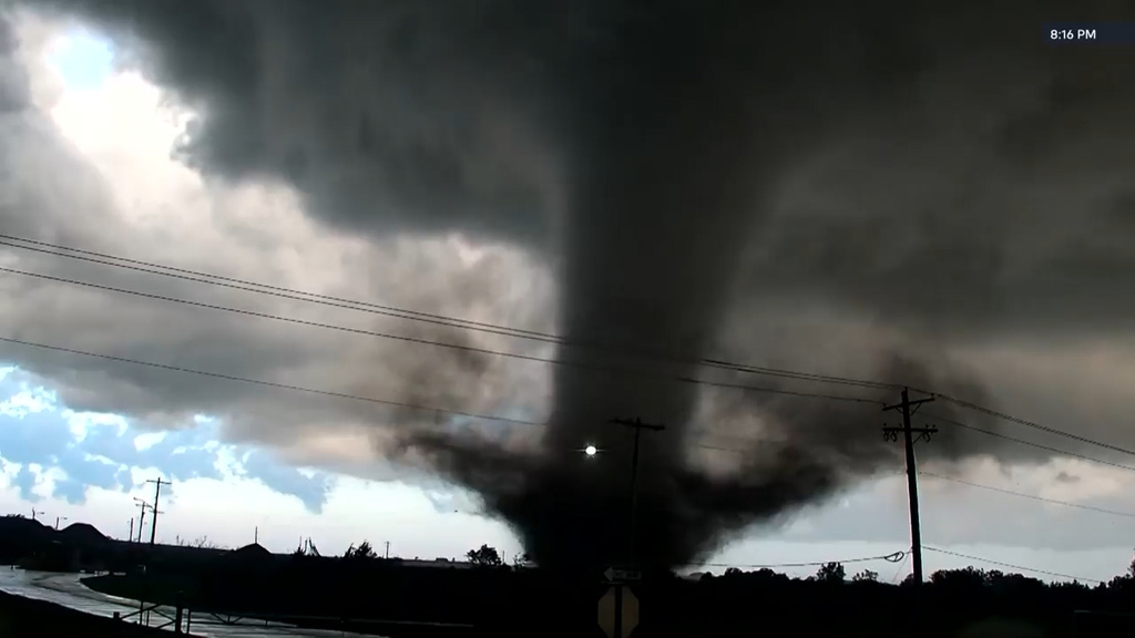 In this image taken from video from KWTV/KOTV, a tornado crosses a highway in Enid, Okla., Thursday, April 23, 2026.