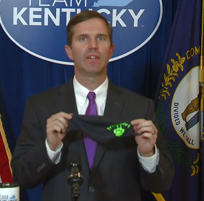 Andy beshear holding a mask.JPG