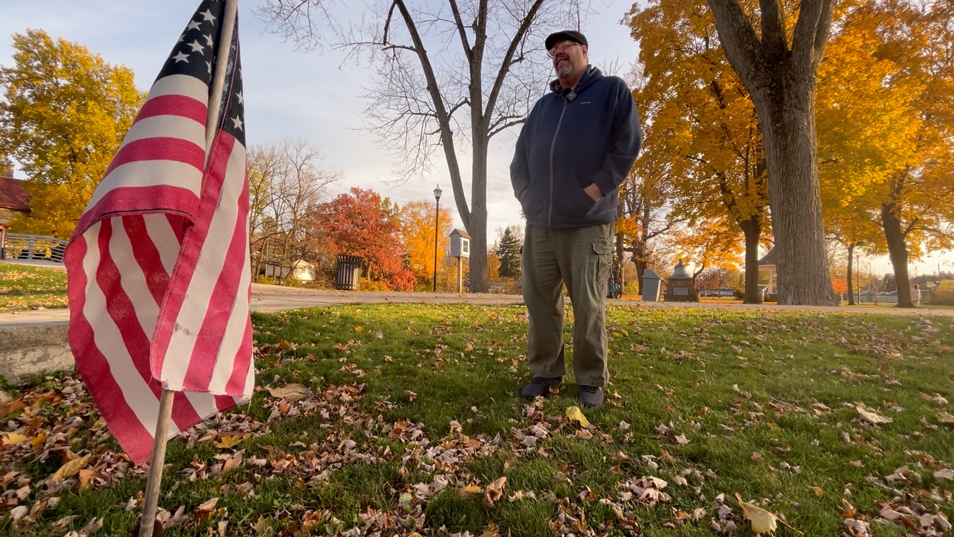 Navy veteran Kraig Orr stands in front of Civil War memorial at Island Park in Eaton Rapids