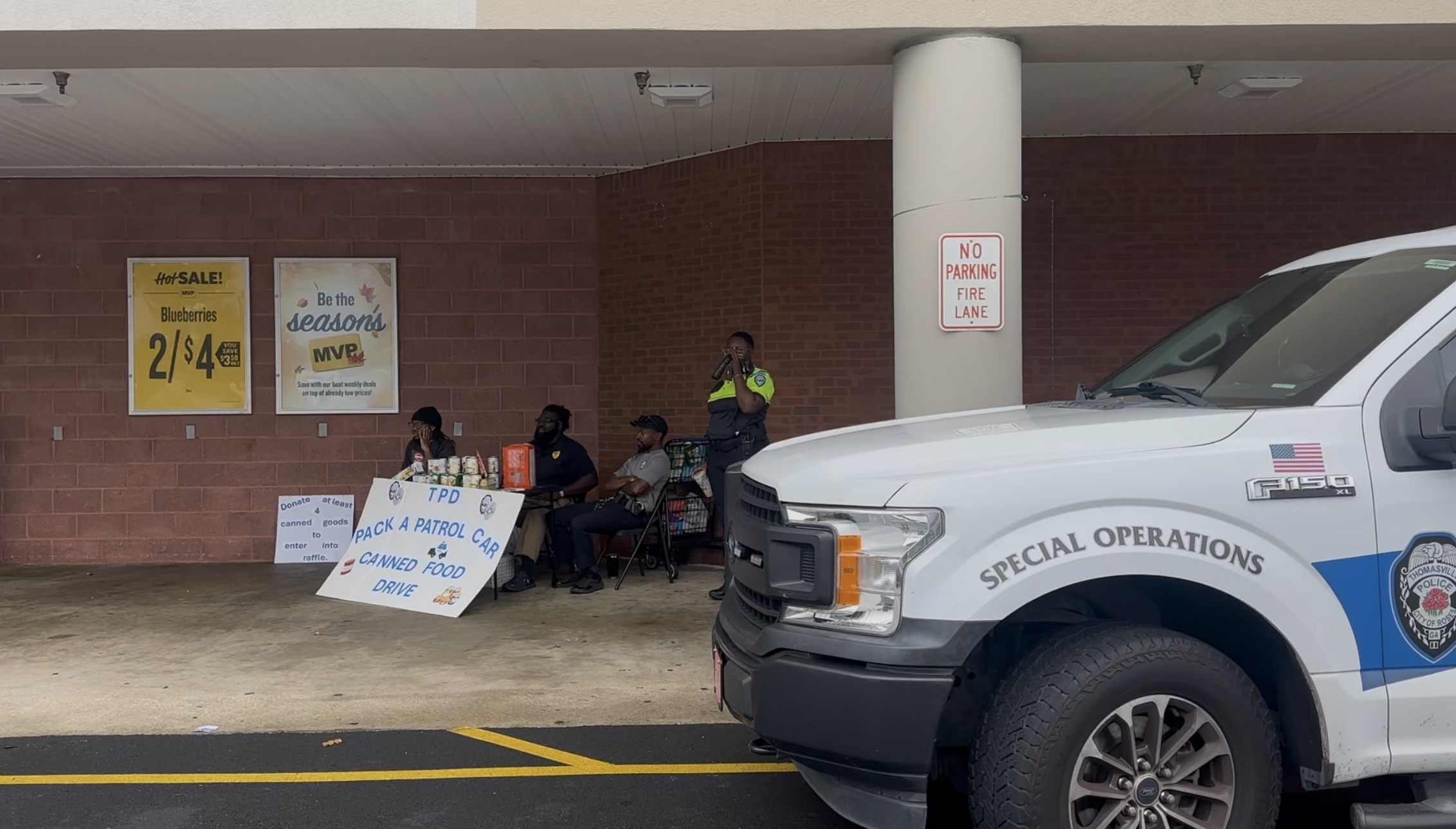 Officers turn patrol cars into food drives for families in need
