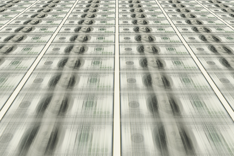 Dollars pile as background