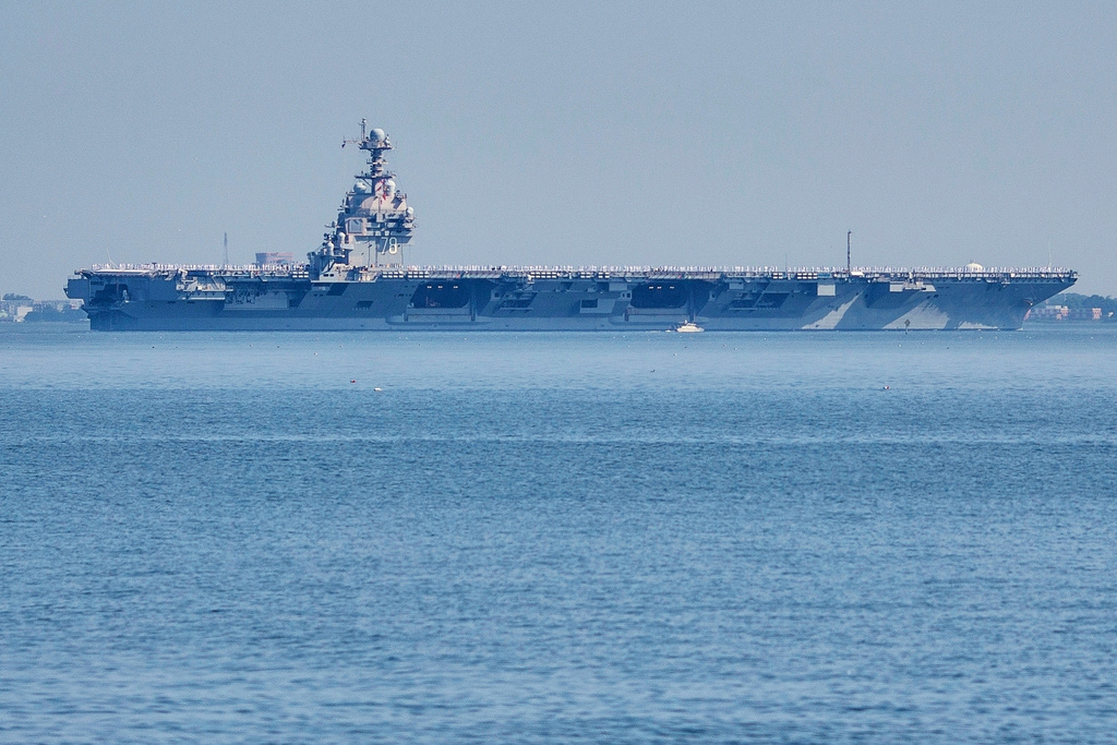 The USS Gerald R. Ford aircraft carrier leaves Naval Station Norfolk, June 23, 2025, in Norfolk, Va. 