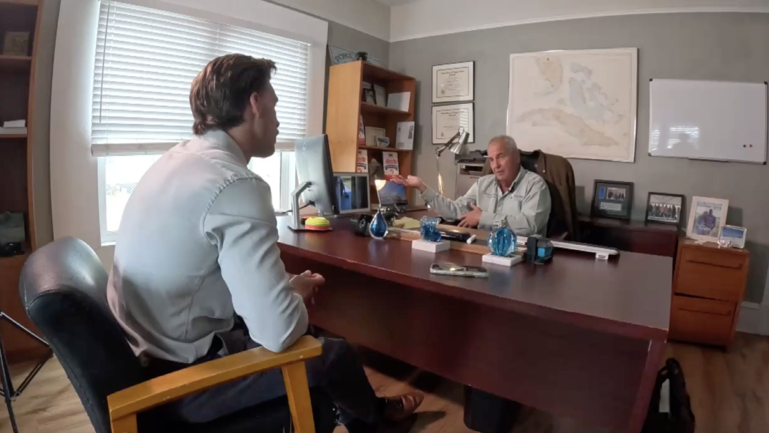 Tyler Hatfield and Fort Pierce City Commissioner Michael Broderick.png