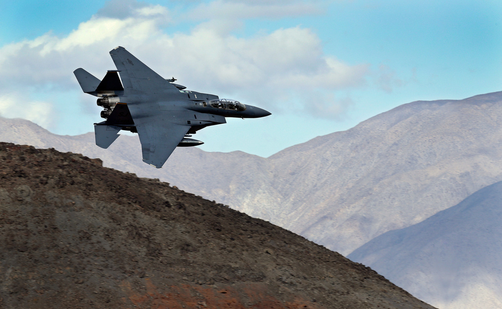 FILE - An F-15E Strike Eagle turns toward the Panamint range over Death Valley National Park, Calif., on Feb. 27, 2017