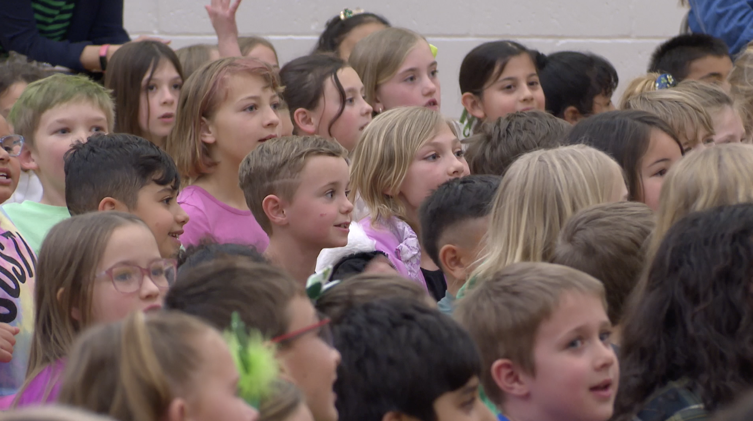 Students at Sawtooth Elementary sing their new school song at an assembly on Monday, March 17, 2025