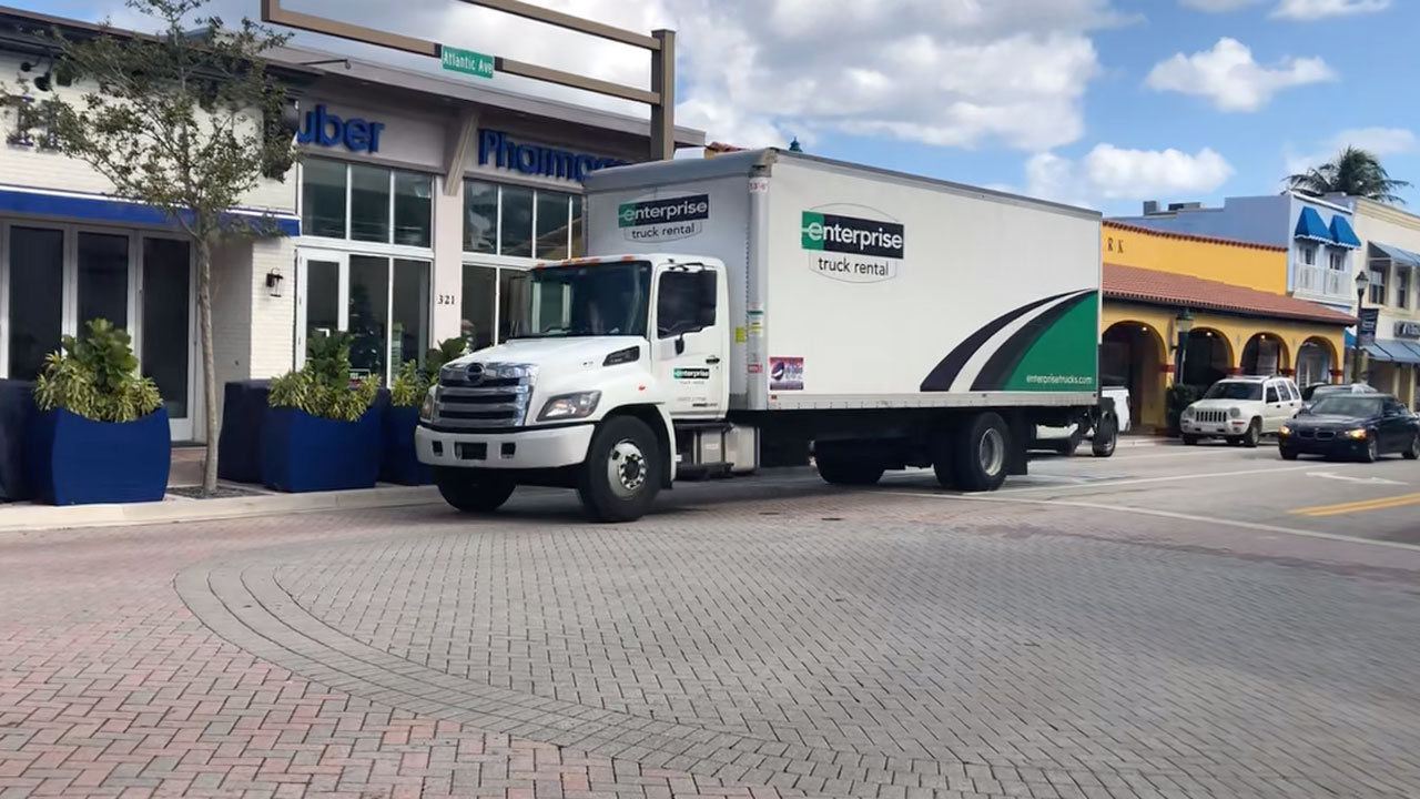 An Enterprise rental truck drives illegally on Atlantic Avenue in Delray Beach, Fla., on Nov. 24, 2020.