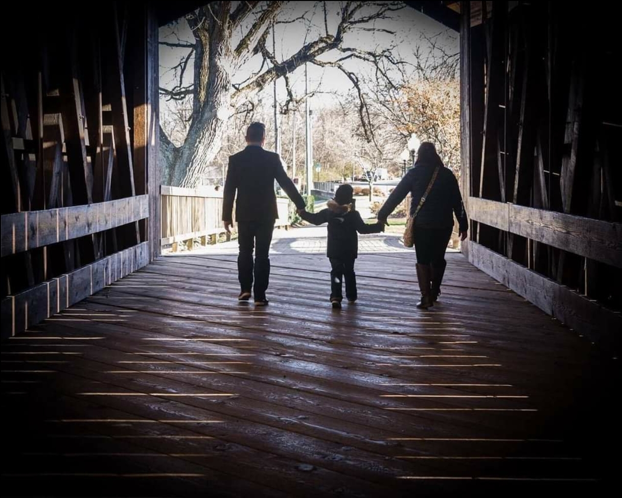 Ace-Marasigan-son-and-wife-walking-on-covered-bridge-by-Two-Eagles-Marcus.jpg