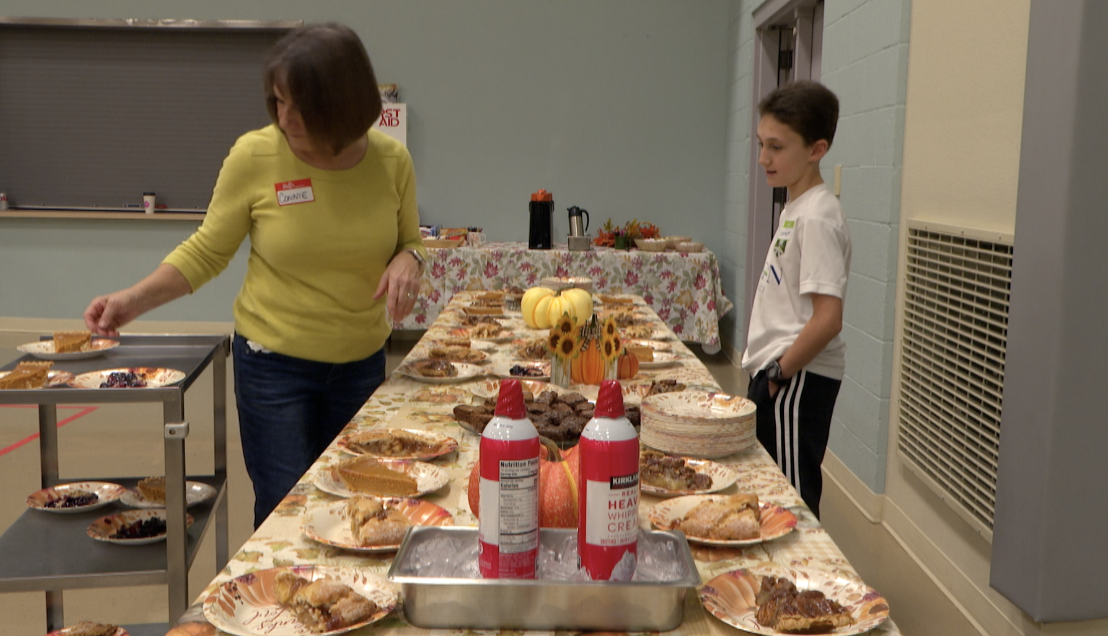 Volunteers take time out of their holiday to help others