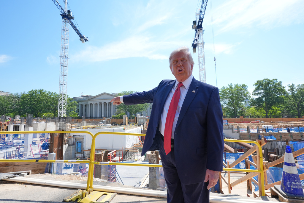 President Donald Trump tours Ballroom construction around the outside the White House, Tuesday, May 19, 2026, in Washington. 