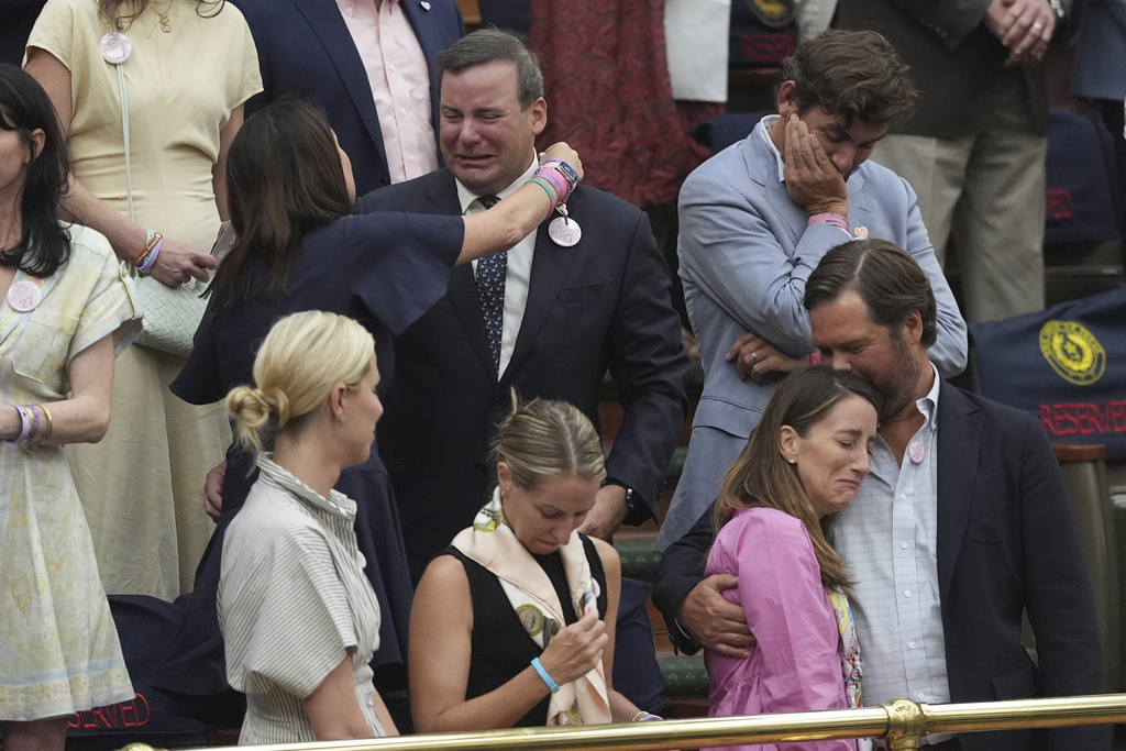 Parents and family of the girls lost to the recent floods at Camp Mystic in Kerr County react after the passage of a Senate Bill related to campground and youth camp safety in the Senate Chamber at the Texas Capitol, Thursday, Aug. 21, 2025, in Austin, Texas. 