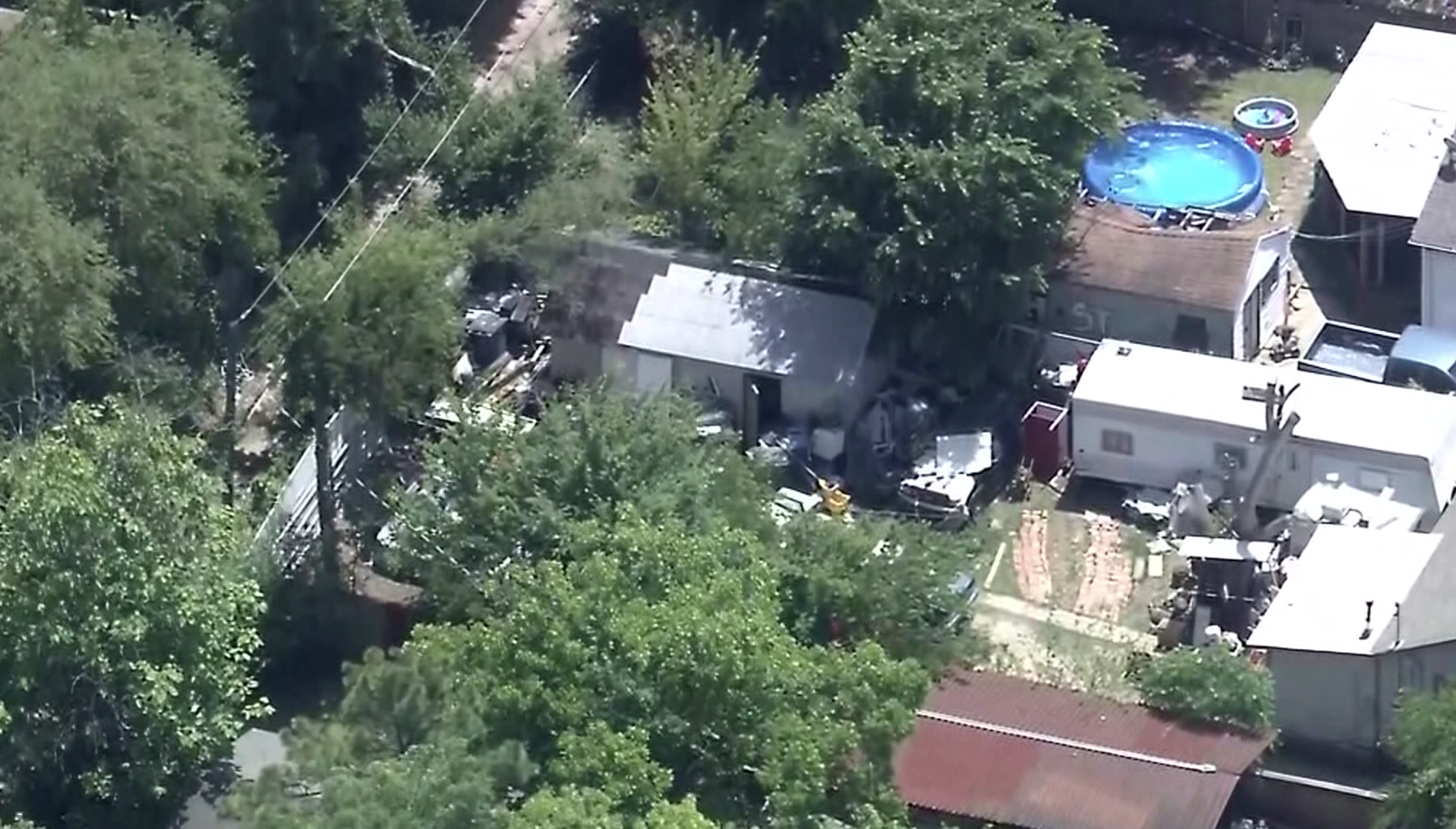 Grandmother, boyfriend charged after 6-year-old boy found tied up in Dallas shed