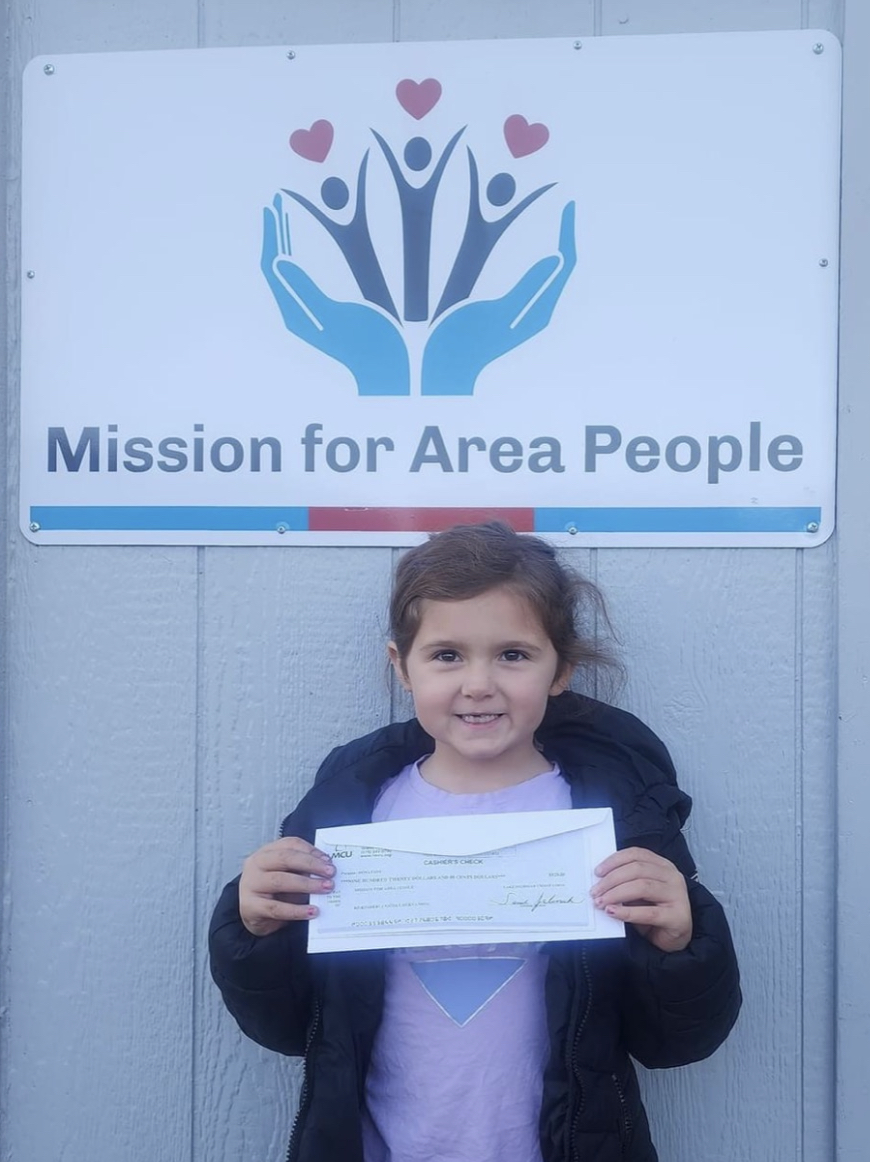 6 year old donates pop cans to MAP