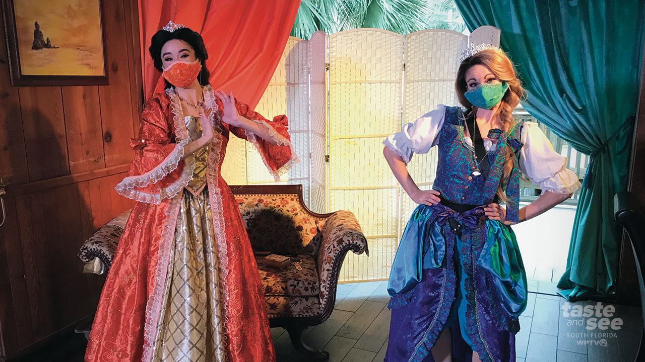 Two princesses pose at Gaylord Palms' Pirates and Princess Weekend in Orlando.