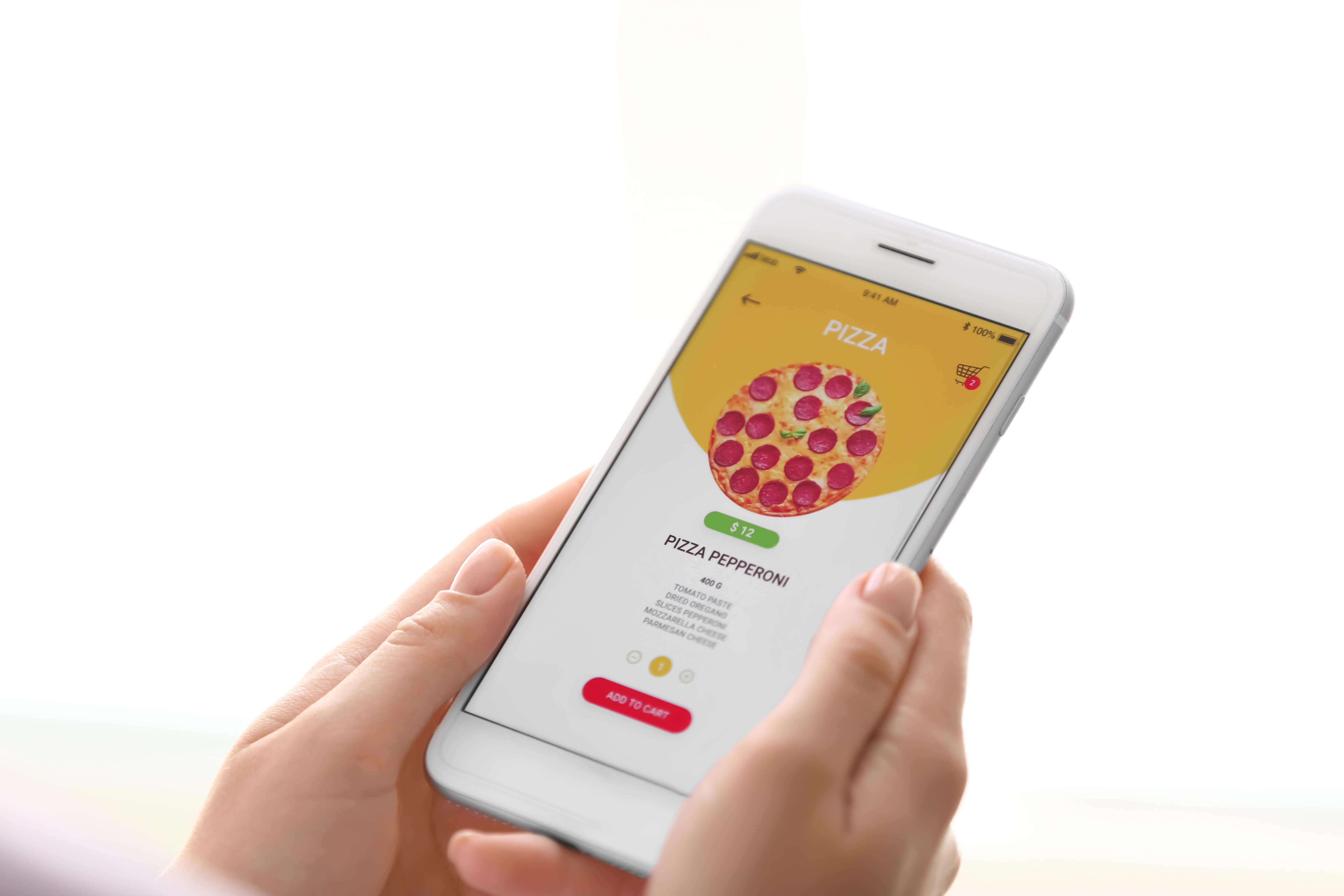 A person orders pizza on a mobile food app. 