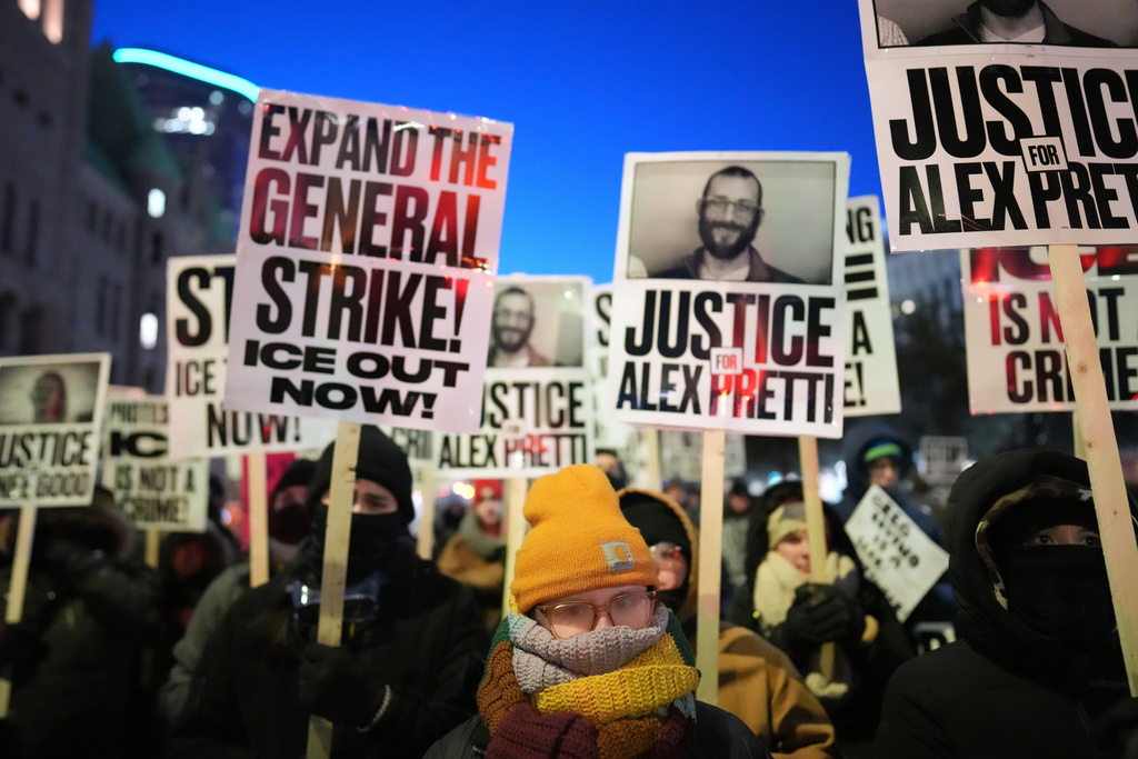 Demonstrators gather during a rally against federal immigration enforcement at Federal Courthouse Plaza on Tuesday, Jan. 27, 2026, in Minneapolis.