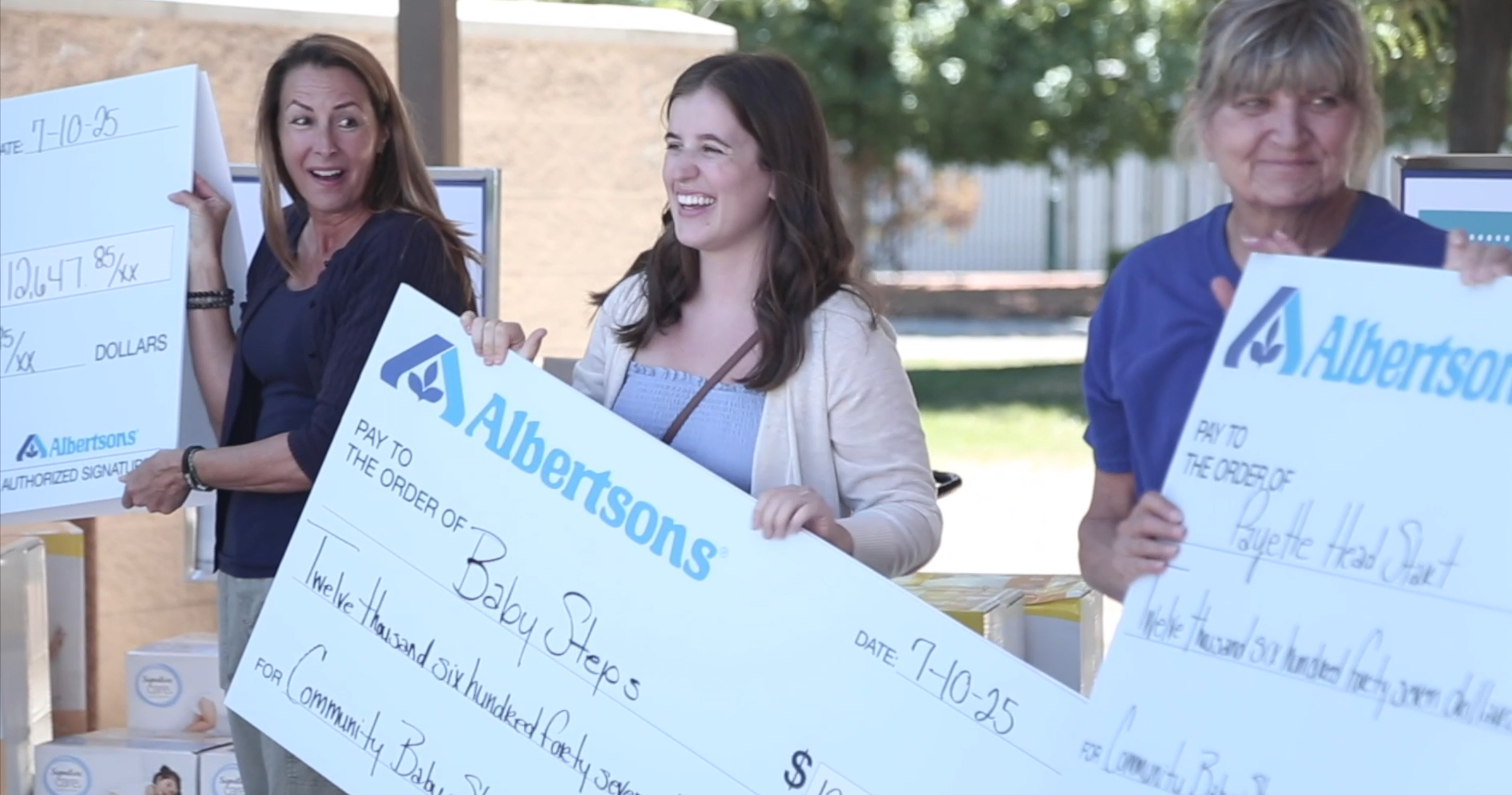 0 community baby shower check presentation.png