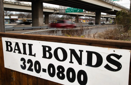 An Austin Bail Bonds II sign near Interstate 35 on Feb. 5, 2021.