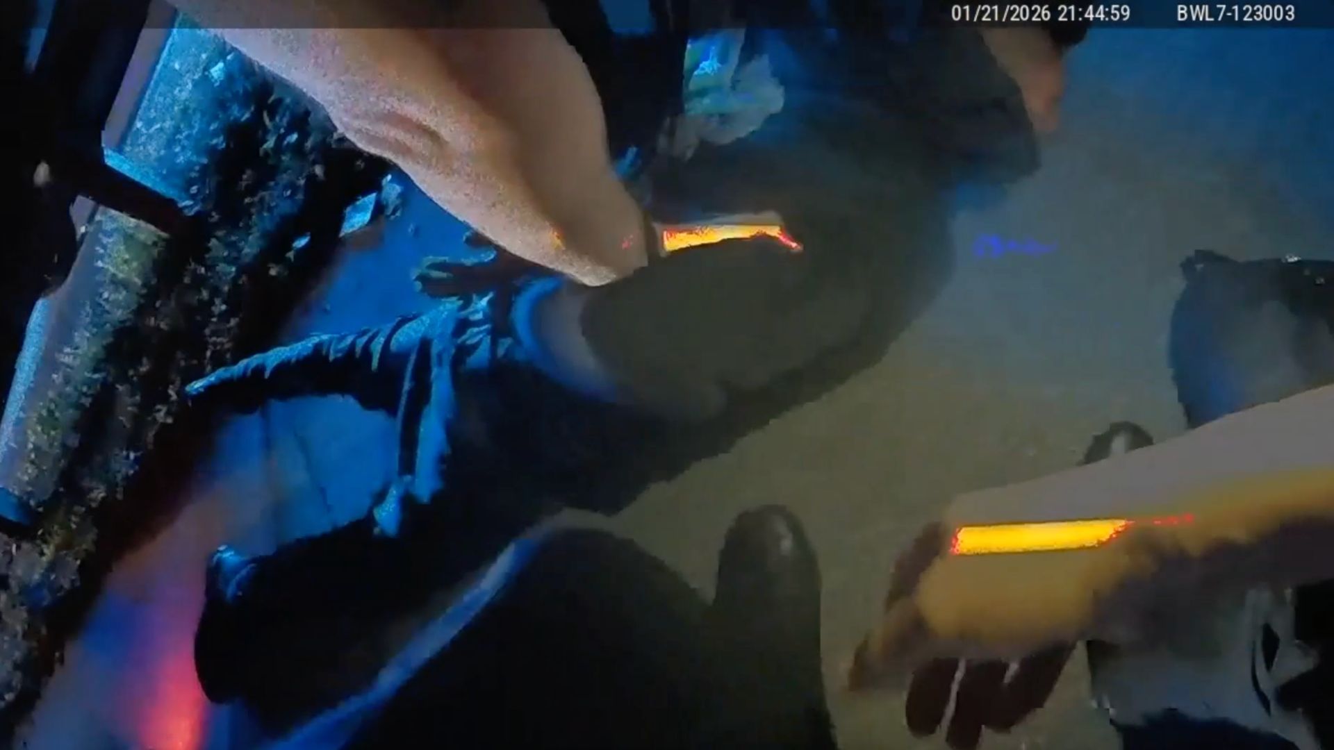 This screenshot from police body camera footage shows the arrest of Royer Perez-Jimenez.