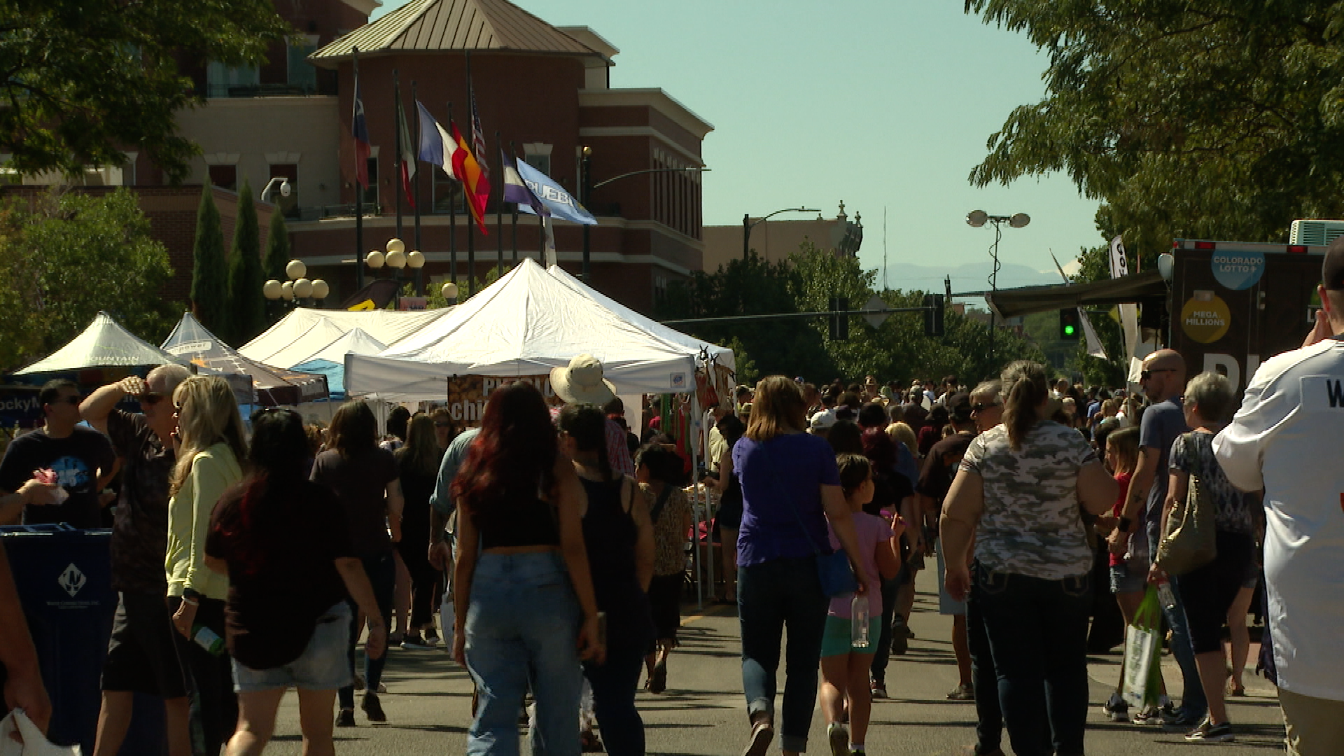 Crowds walk through downtown Pueblo at the Chile Fest