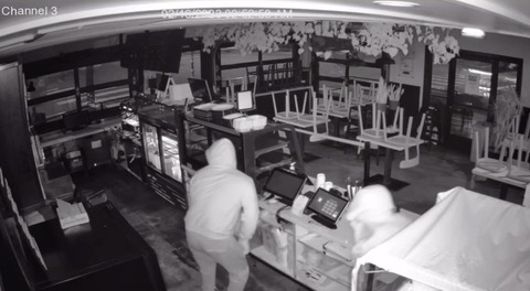 Surveillance video of a break in at Pop Pie Co. shows a suspect smashing what appears to be a safe.