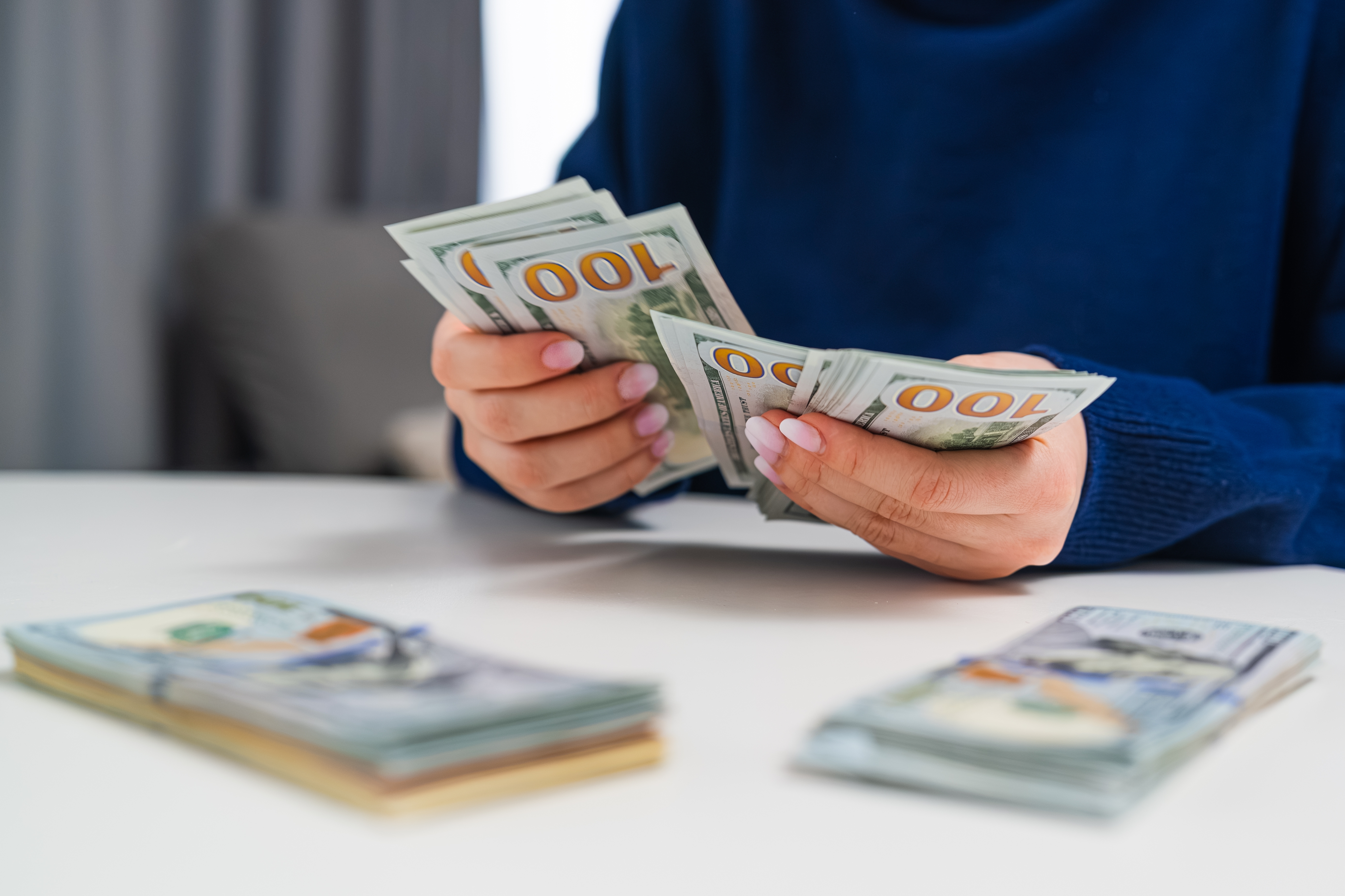 Woman counting money.