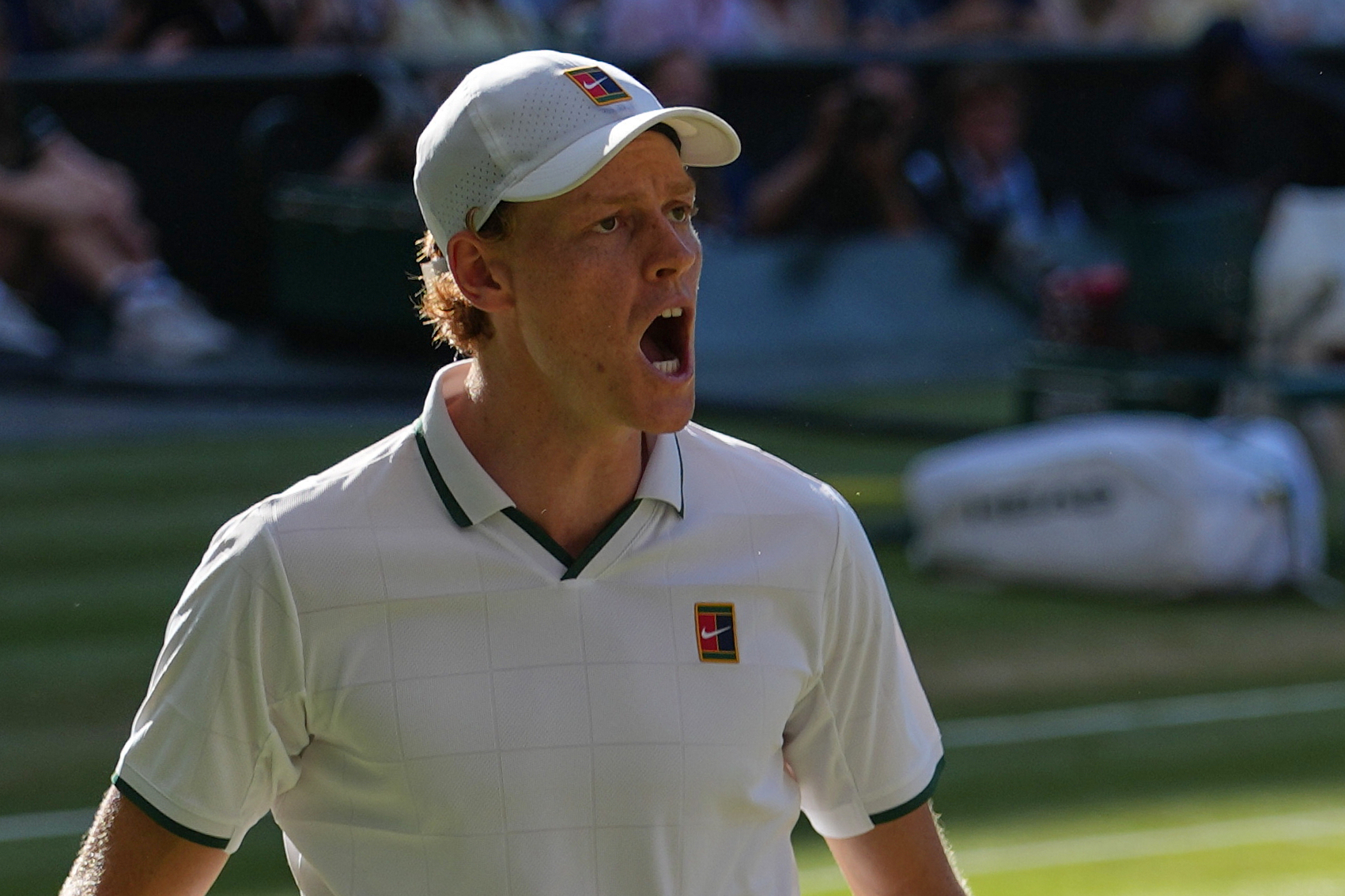 Jannik Sinner of Italy celebrates a point against Alexander Zverev of Germany in the men's singles final at Wimbledon Tennis Championships in London, Sunday, July 12, 2026.