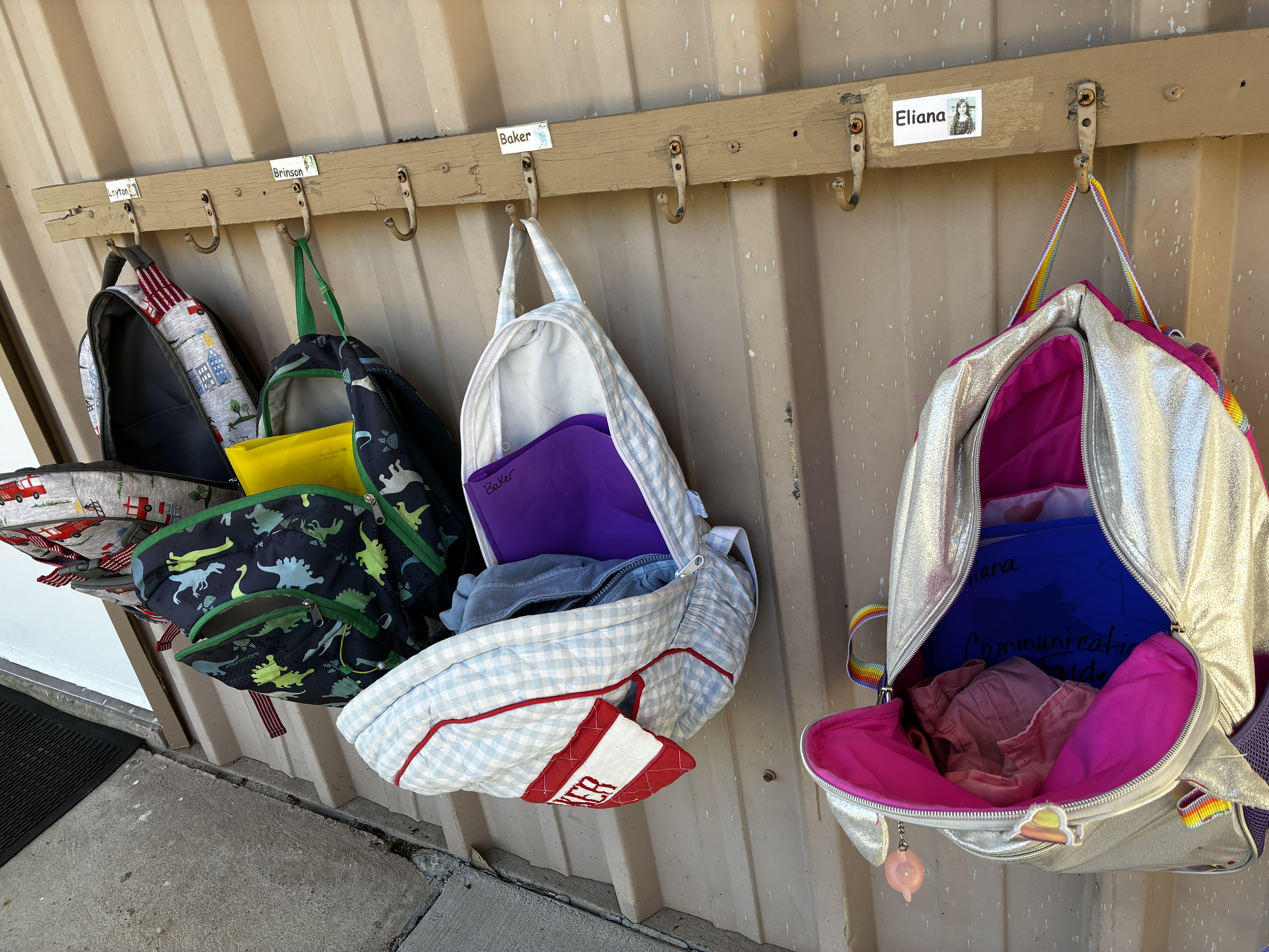 Students' backpacks hang outside a classroom at Aucilla Christian Academy in Monticello as the school continues to grow enrollment.